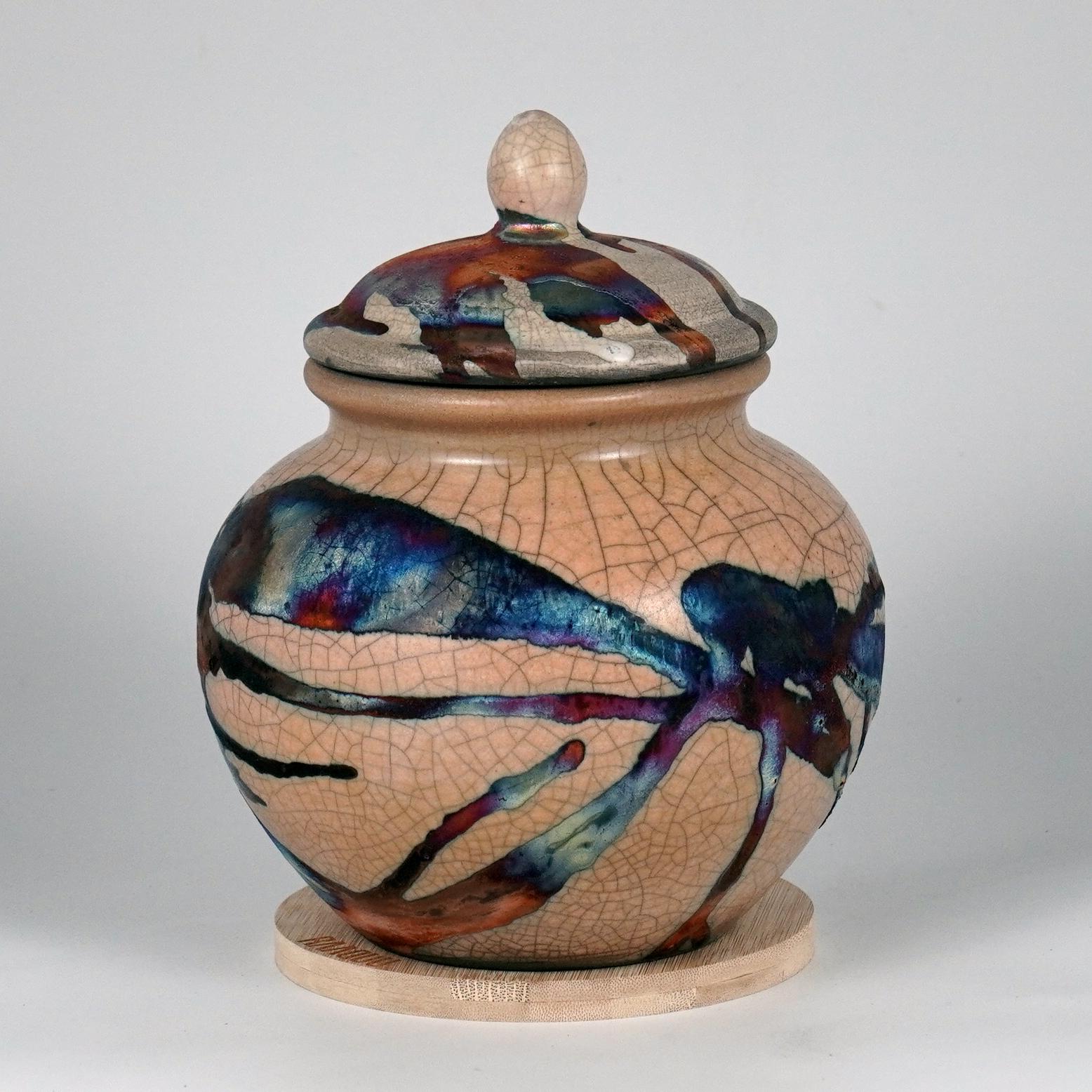 Tamashii Urn ~ 魂 (Soul)

The Tamashii Urn serves as a focal point of remembrance for a loved one that has passed from this life but not from your heart. This vessel is fired using the Raku technique where no two pieces are the same.

Capacity : up