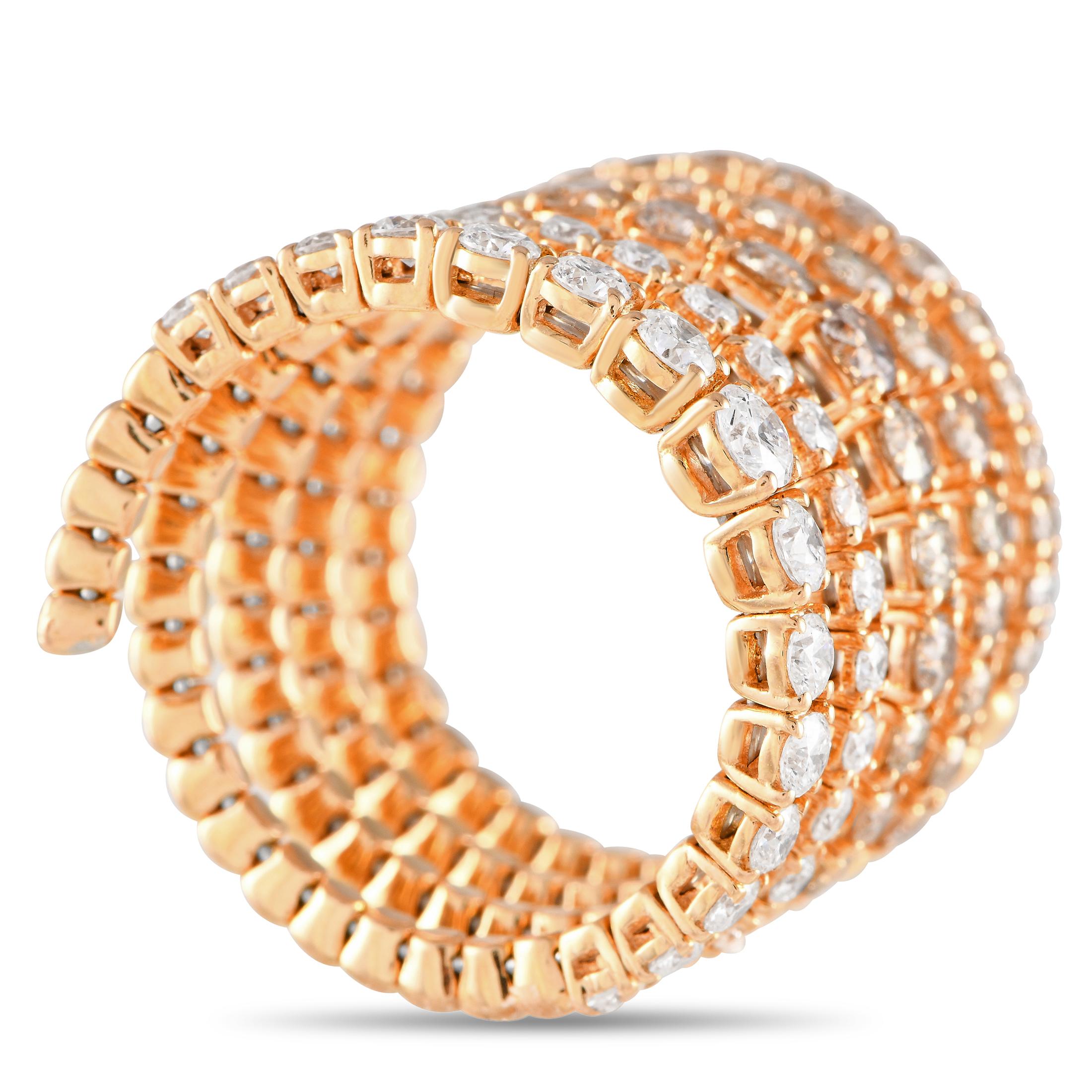 Introducing an ultra-chic coil ring by Rabat Spain ready to elevate your style in an instant. This fashion-forward piece features a continuous line of four-prong baskets in varying sizes looped five times to form an attractive coiled ring. Each