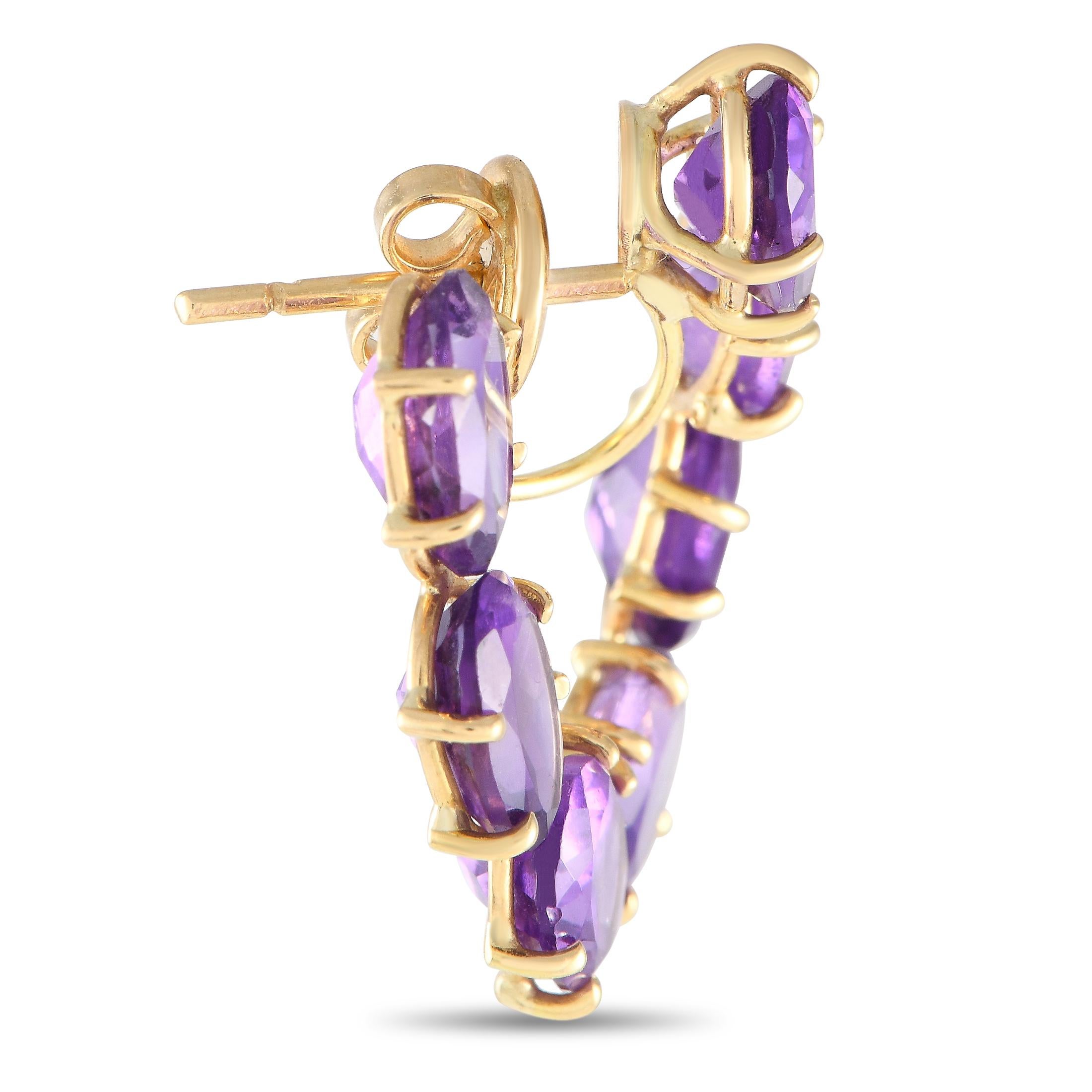These trendsetter-approved circlet earrings from Rabat feature a solid 18K yellow gold base detailed with beautiful oval amethyst gemstones. Four slim prongs secure each faceted purple gem.This pair of Rabat 18K Yellow Gold Amethyst Circlet Earrings