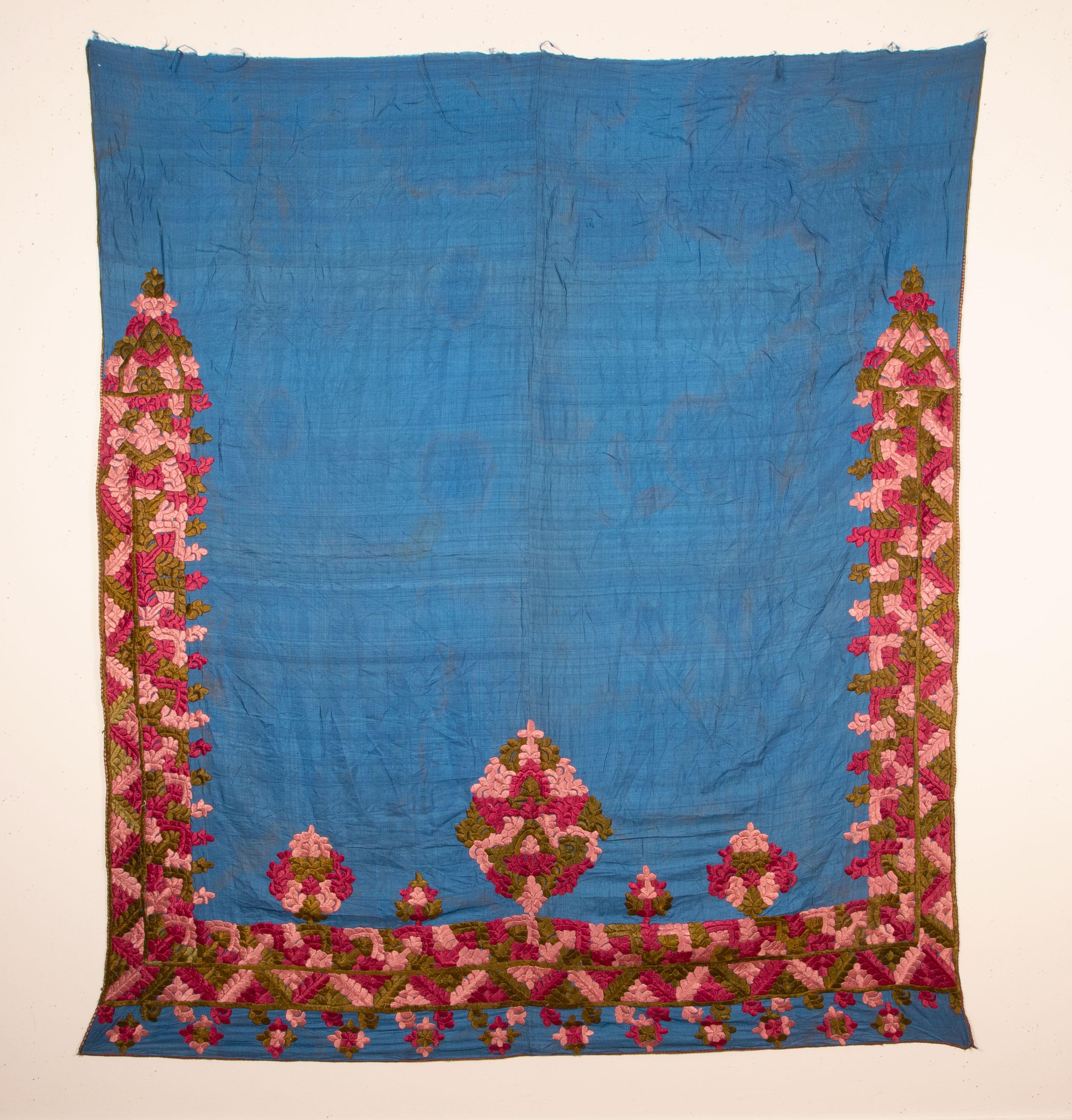 This is silk embroidery on a silk blue background. A rare item to come by.