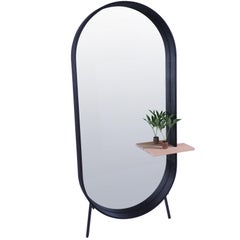 Racetrack mirror, contemporary floor mirror with shelf by Pat Kim.