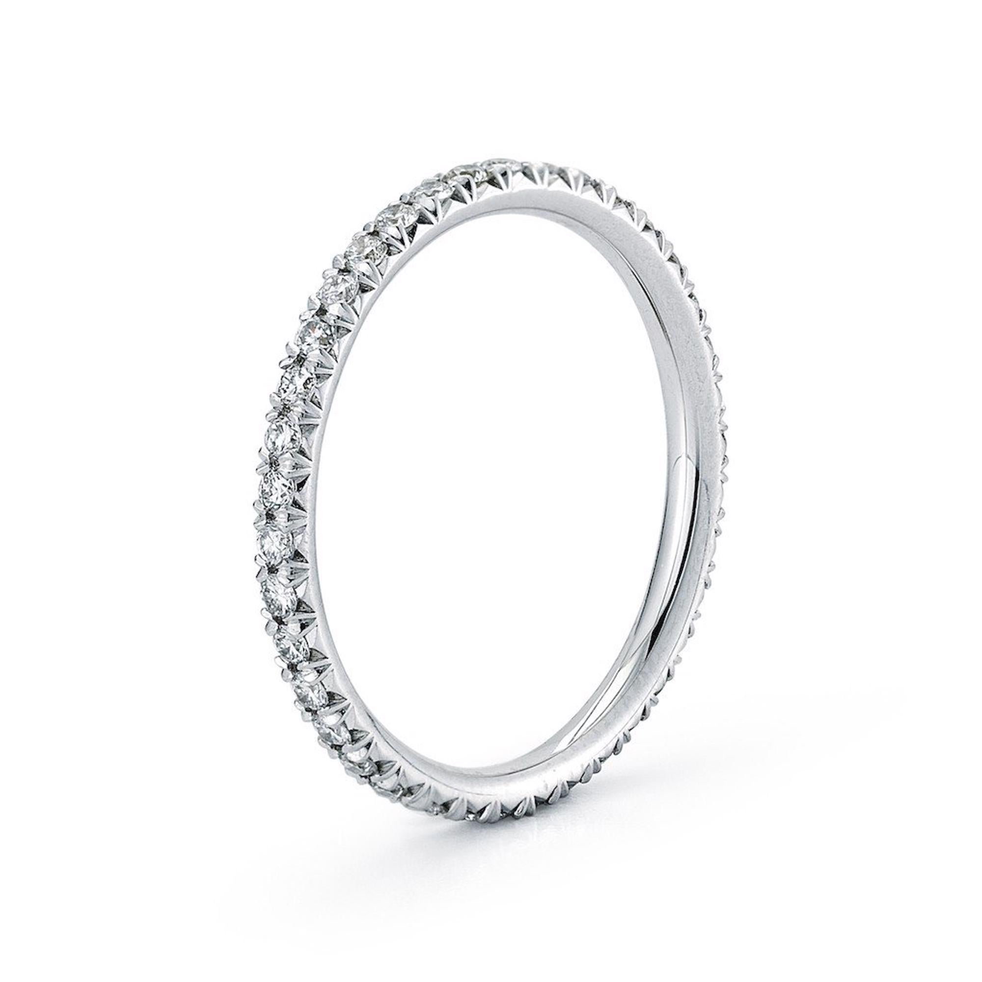 Beautiful diamond pave ring with amazing quality handset diamonds in a full circle mounted in 18k white gold. Diamonds are F-G color and VVS-VS clarity with an appraisal of authenticity. Total carat weight is 0.45 cttw and width 1.5 mm. Ring size