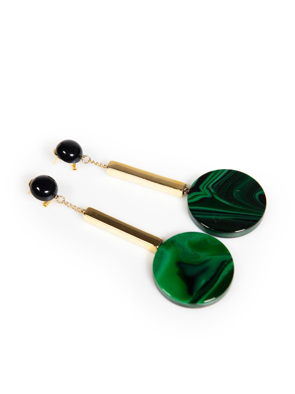 CONDITION is Good. Minor wear to earrings is evident. Light scratches to the metal and resin on this used Rachel Comey designer resale item.
 
Details
Green and gold
Resin
Drop earrings
Gold tone metal bar
Stud and clip fastening
