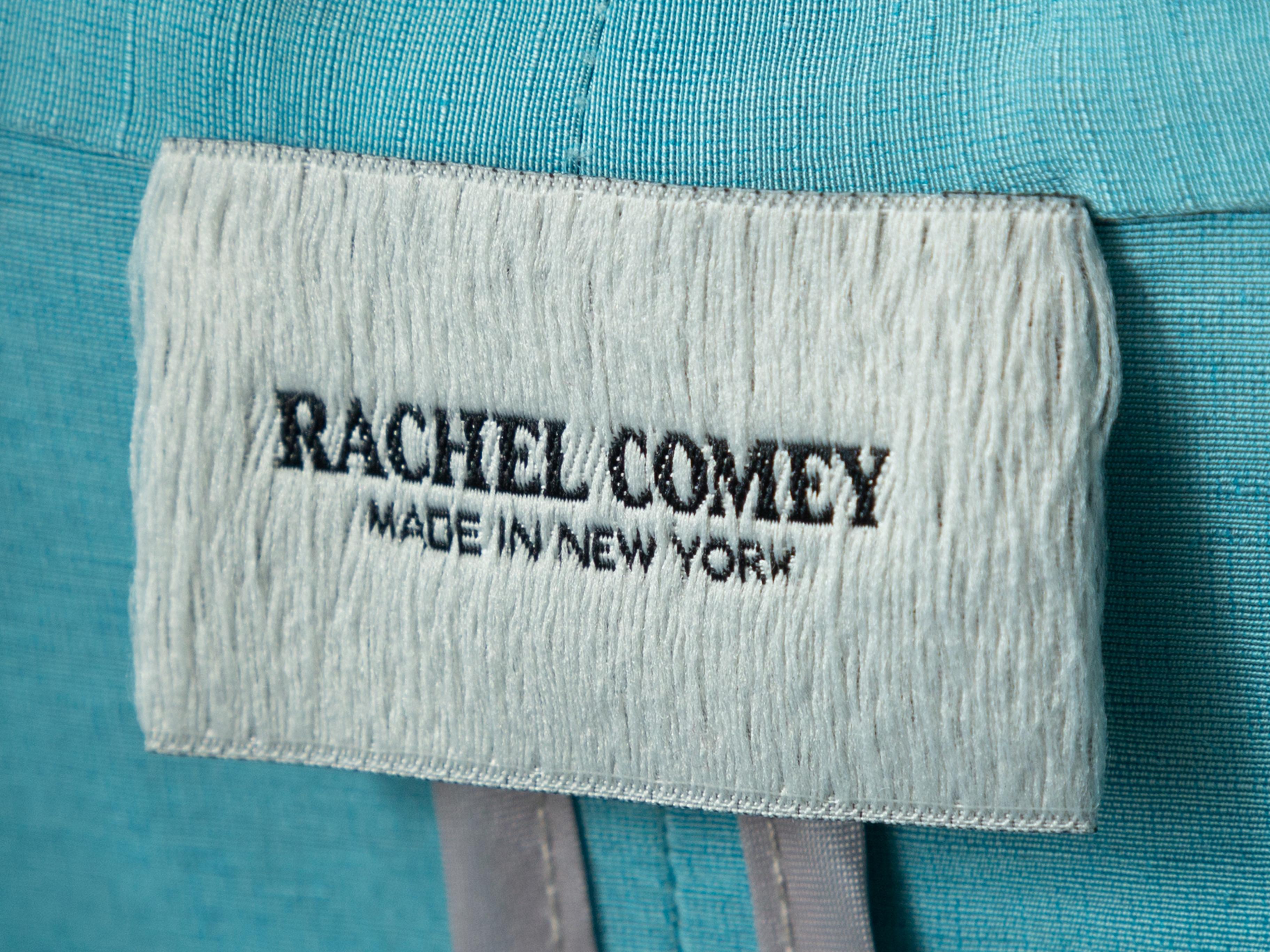 Product details: Turquoise three-quarter puff sleeve blouse by Rachel Comey. Pointed collar. V-neck. Designer size 2. 31