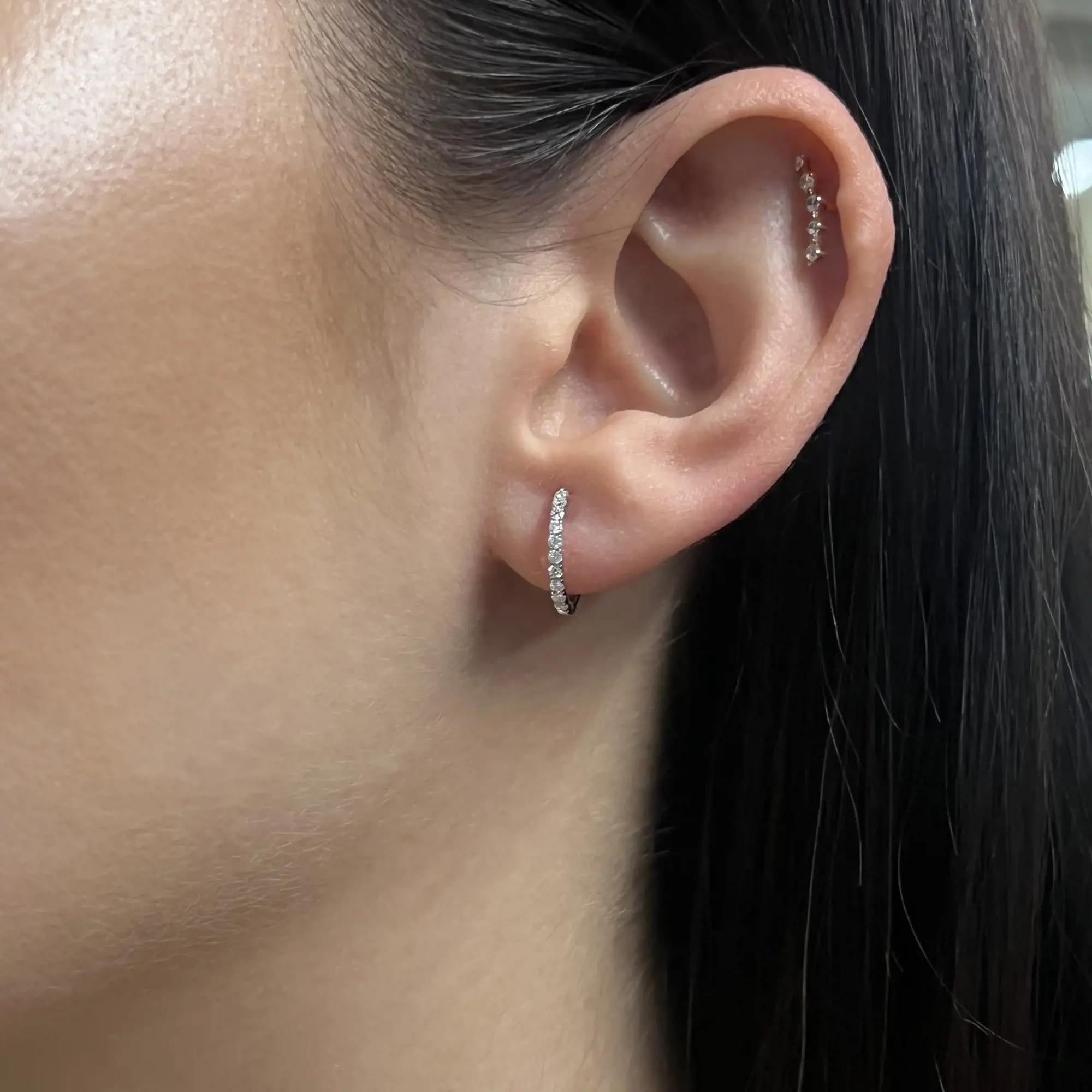 Modern Rachel Koen 0.20 Cttw Round Cut Diamond Huggie Earrings 14K White Gold For Sale