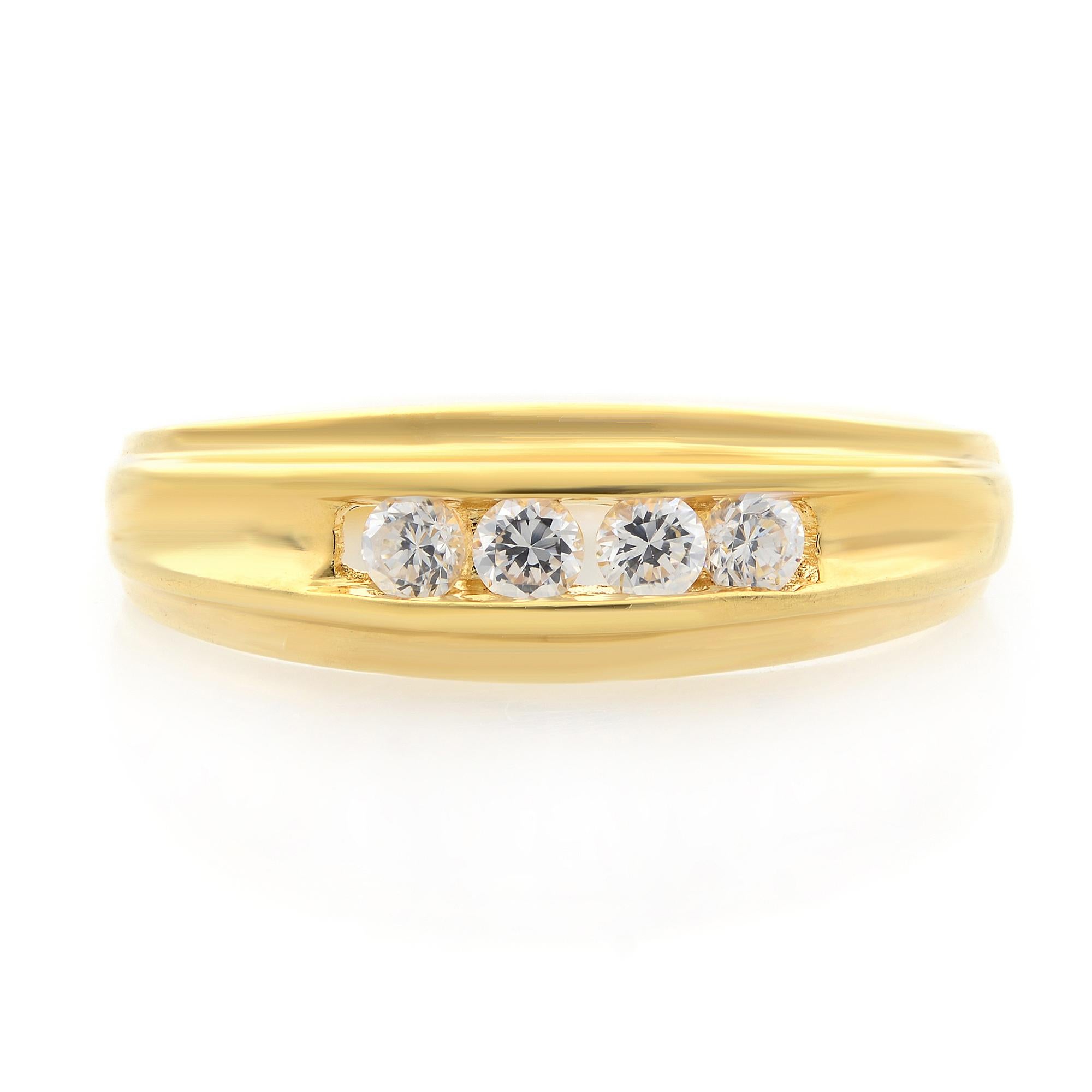 Classic and elegant diamond band ring rendered in highly polished 18k yellow gold. This ring features 4 perfectly matched sparkling round brilliant cut diamonds in channel setting totaling 0.25 carat. Diamond quality: G-H color and VS-SI clarity.