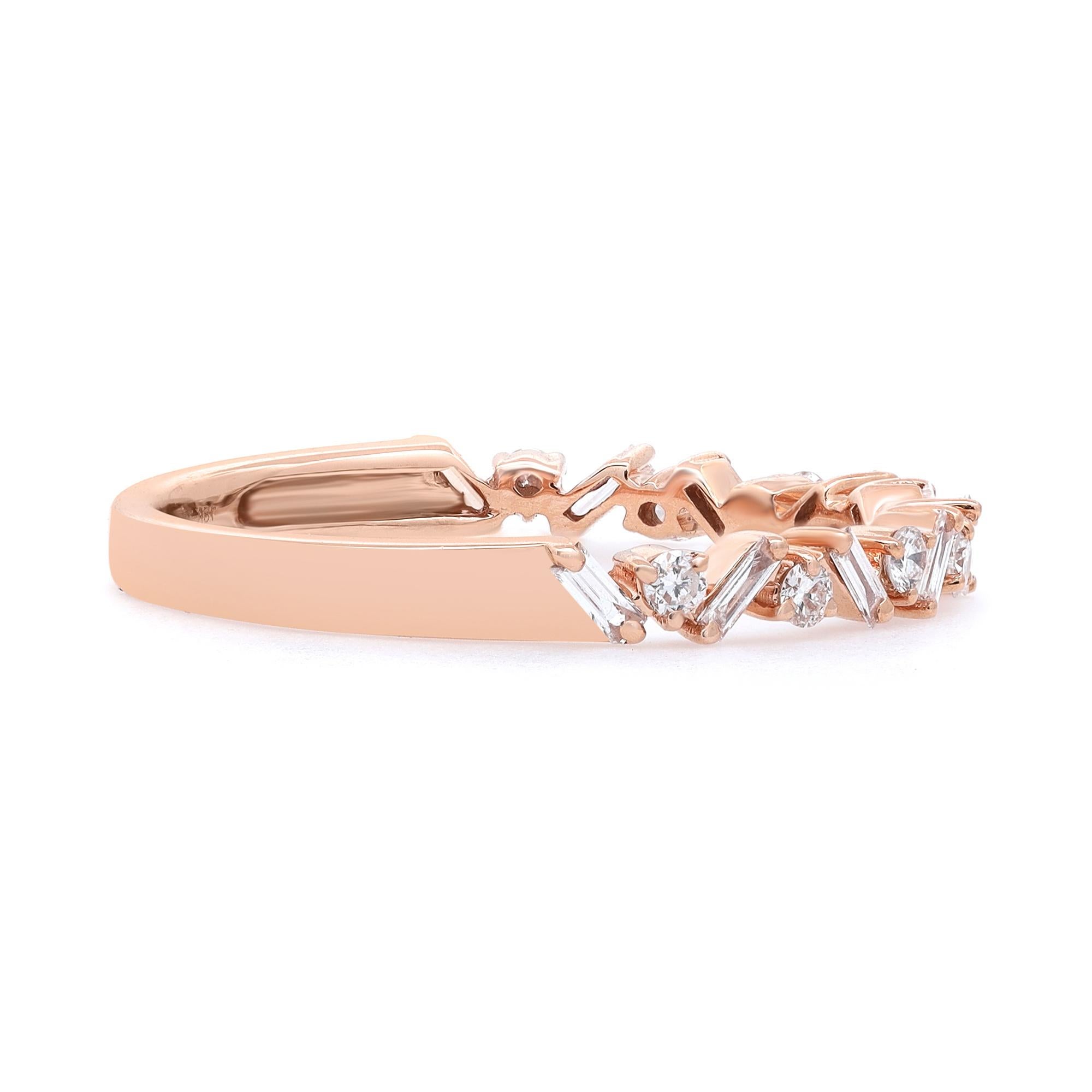 Simple and delicate diamond ring crafted in 18k rose gold. This ring features prong set baguette cut diamonds set in a zig-zag pattern portraying a timeless, eye-catching style. It's stackable and easy to mix and match. Total diamond weight: 0.30ct.
