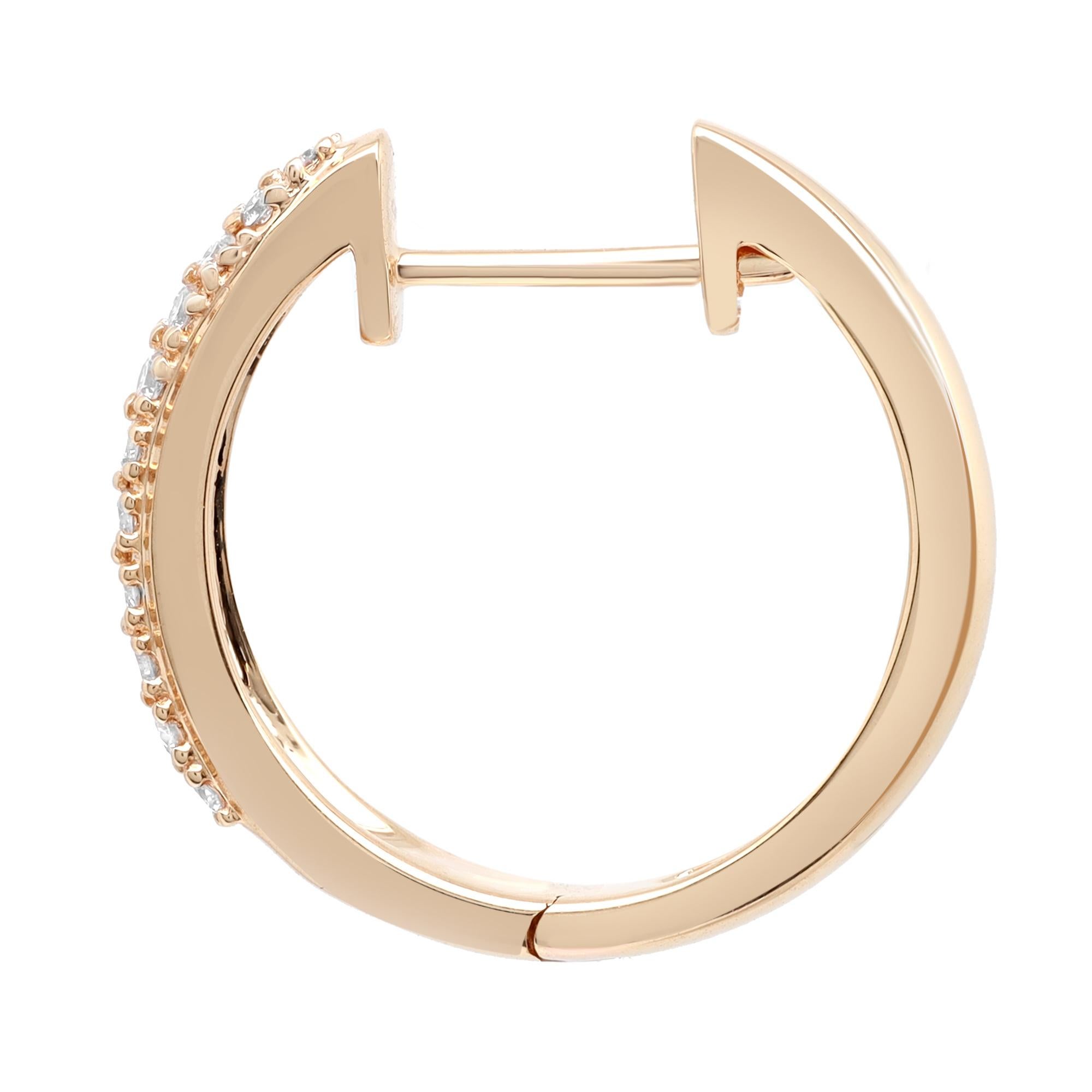 Sleek and classic, a timeless pair of diamond huggie hoop earrings, perfect for a great everyday look. These earrings are crafted in 18K yellow gold and encrusted with prong set round cut diamonds weighing 0.41 carat. Diamond color G-H and clarity