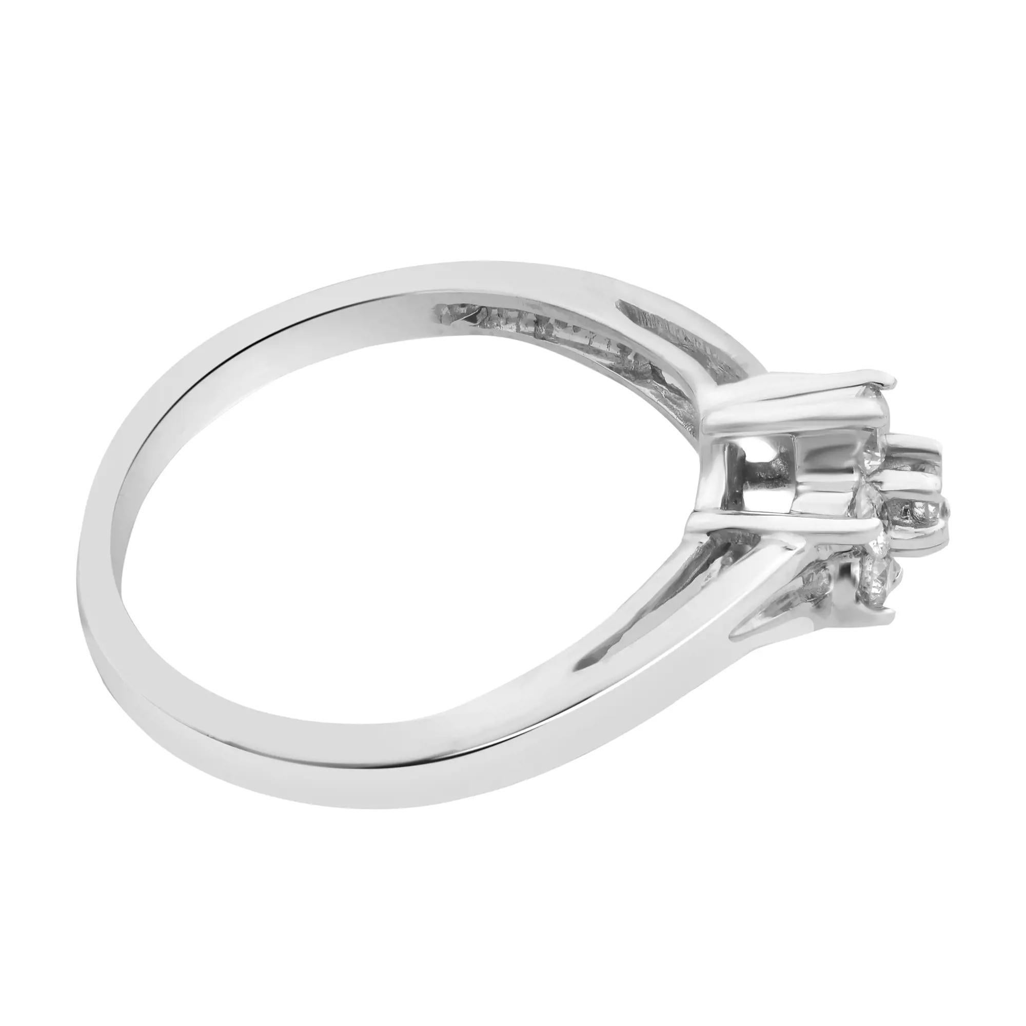 This beautiful and alluring ladies ring features 7 prong set round brilliant cut diamonds set in a flower shape weighing 0.50 carat. Crafted in highly polished 10k white gold. Diamond color G-H and VS-SI clarity. This ring is a wonderful way to make