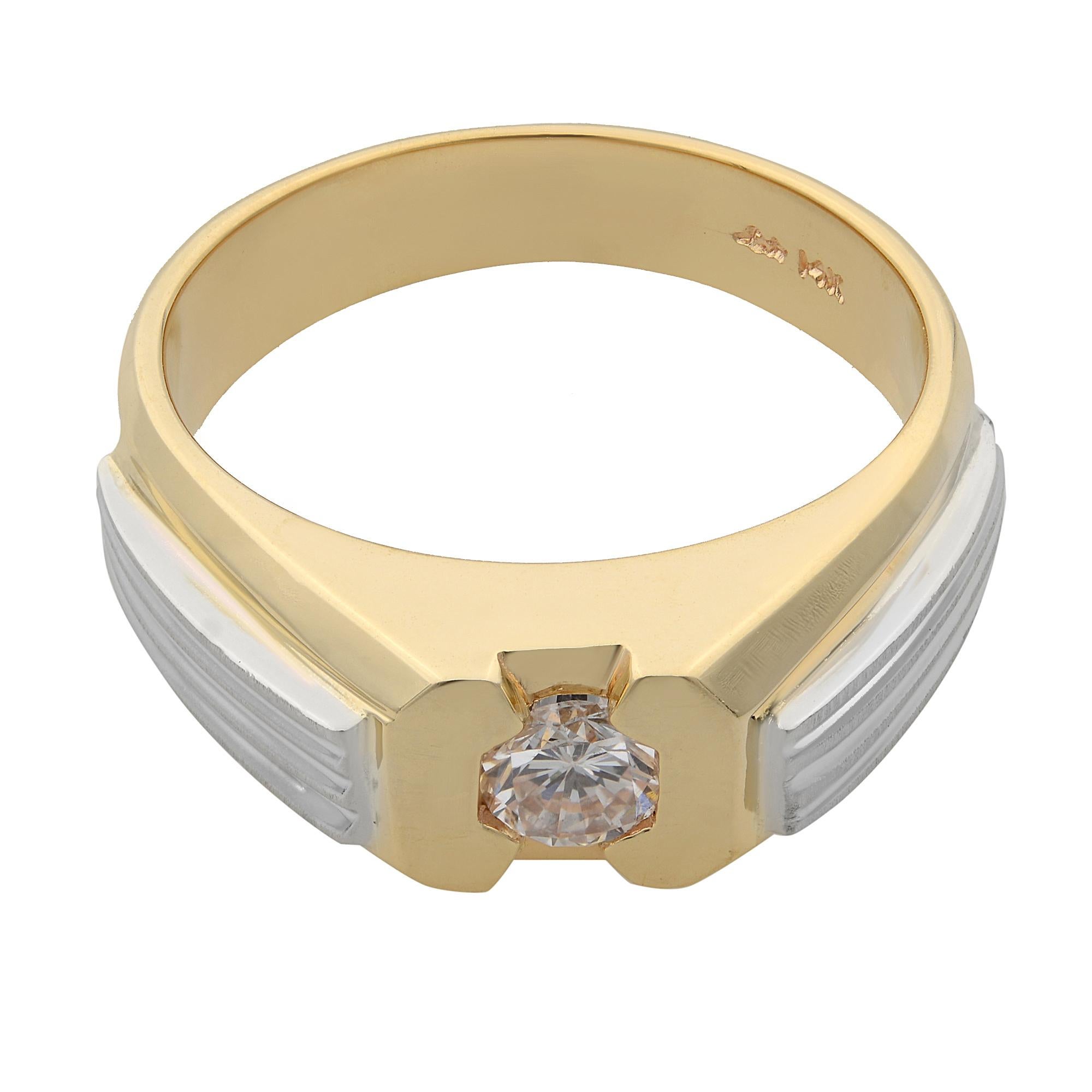 This stunning men's band ring is crafted in 14k yellow with white gold lines on the shoulders. It features a center round brilliant cut diamond weighing 0.50 carat. Diamond quality: color I and clarity SI1. Ring size: 10.5. Band width: 7.4 mm. Total