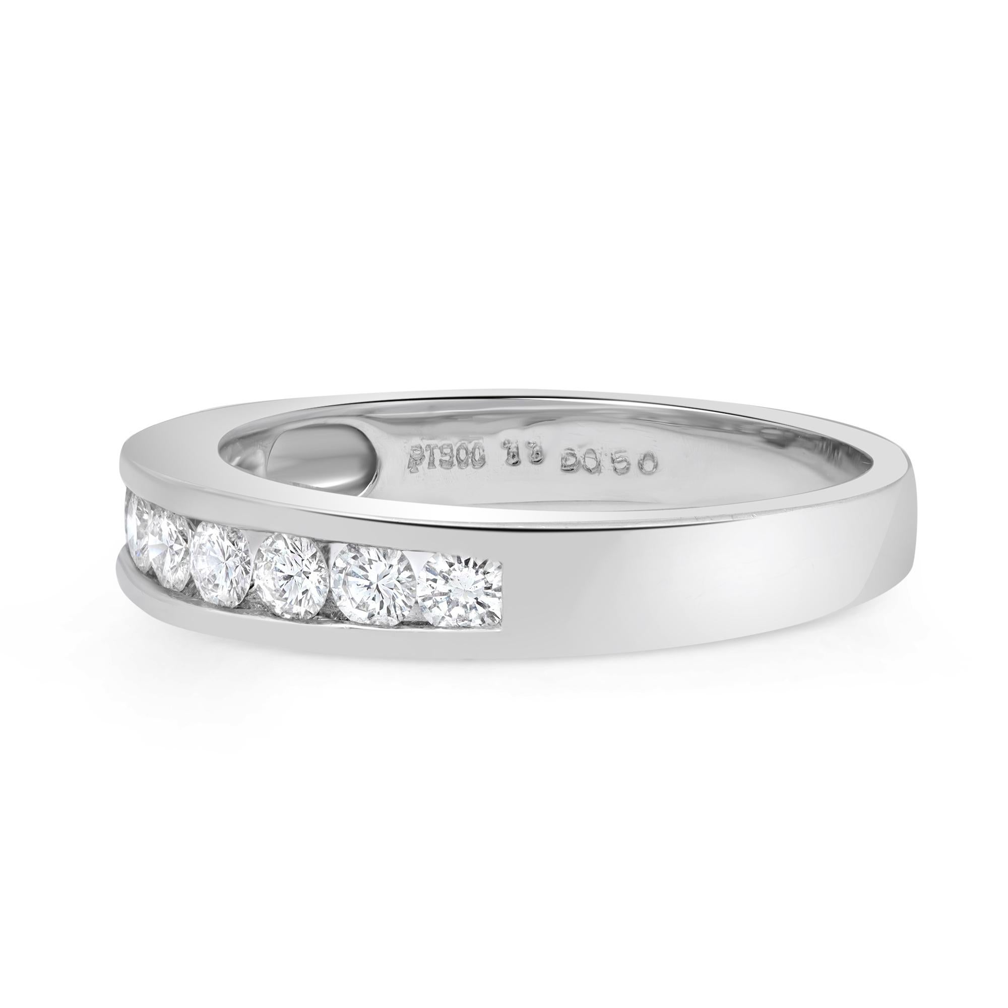 Timeless and stylish diamond wedding band ring. Crafted in fine high polished platinum. This ring features 9 dazzling round brilliant cut diamonds in channel setting. Perfect for a gift or as a promise ring. Total diamond weight: 0.50 carat. Diamond