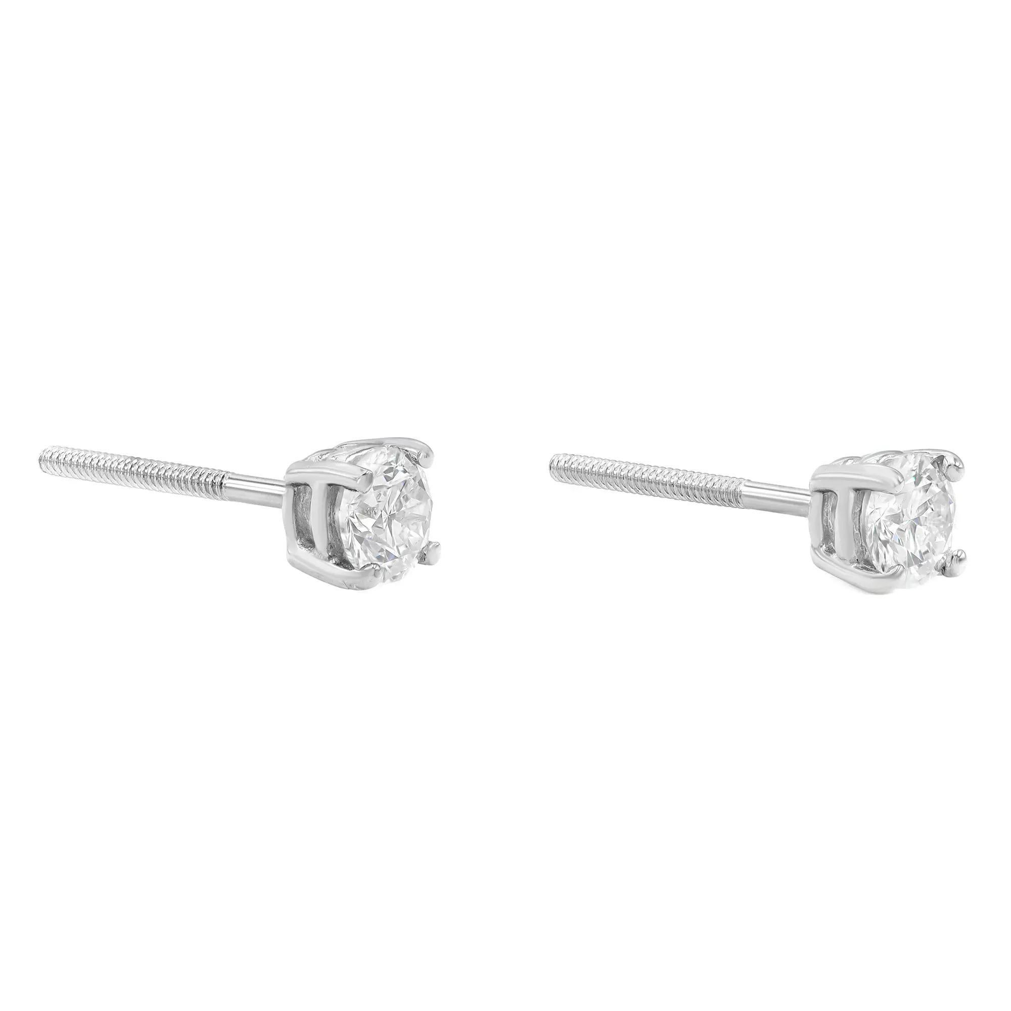 Gleaming with sparkle. Beautifully matched, these diamond stud earrings feature a total of 0.50 carat of round brilliant cut diamond pair with H color and VS2-SI1 clarity. Crafted in high polished 18k white gold with four prong setting. Always in