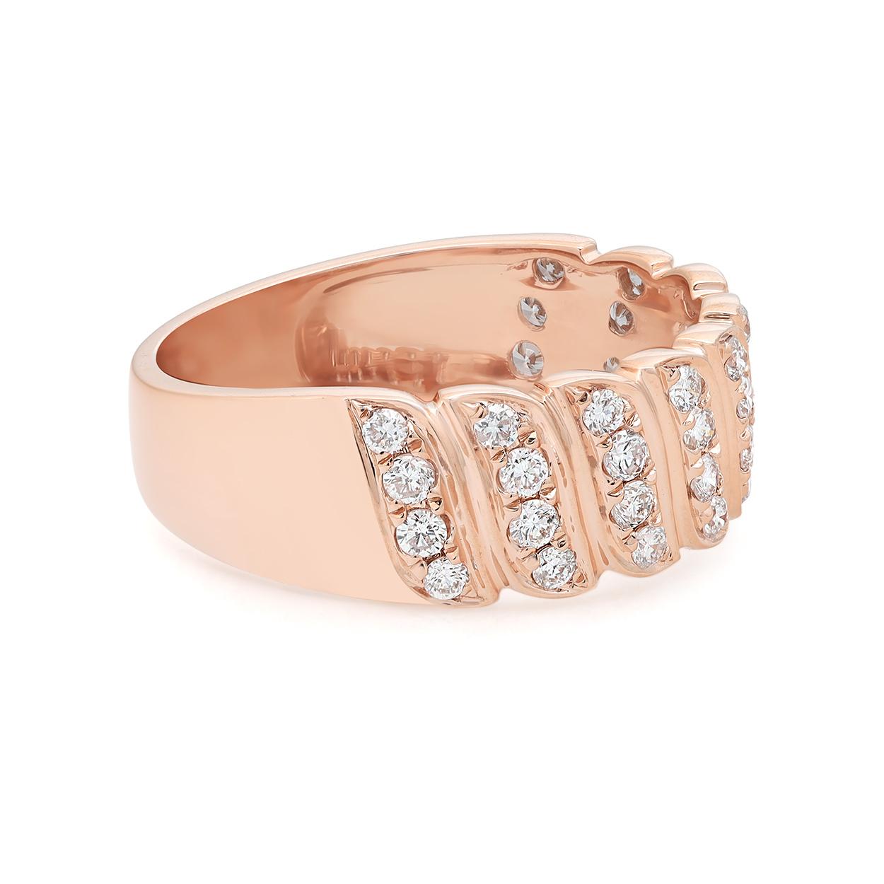 This timeless and stylish diamond band ring is crafted in 18k rose gold and features 36 pave set dazzling round brilliant cut diamonds weighing 0.52 carat. Diamond quality: G-H and clarity VS-SI. A spectacular symbol of love, perfect for a gift or