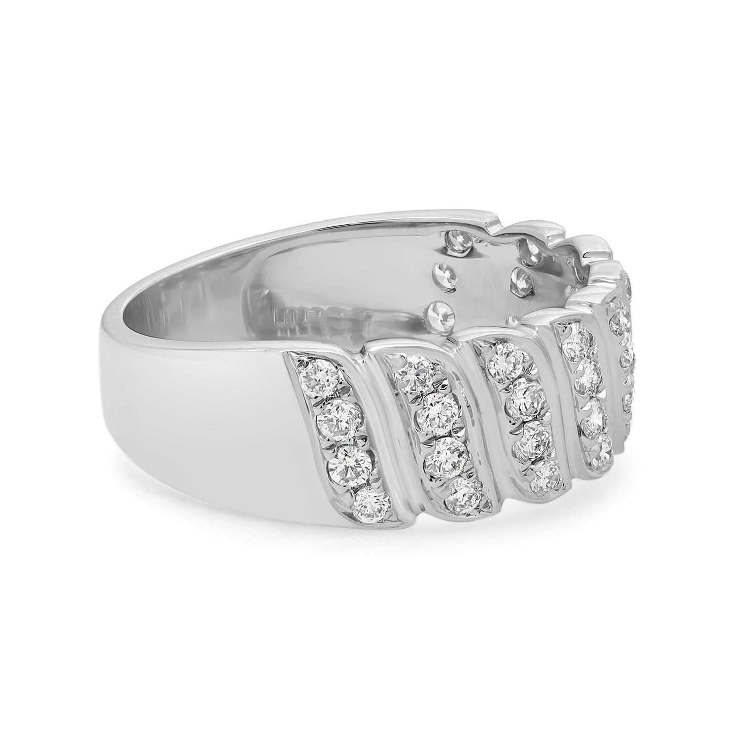 This timeless and stylish diamond band ring is crafted in 18k white gold and features 36 pave set dazzling round brilliant cut diamonds weighing 0.52 carat. Diamond quality: G-H and clarity VS-SI. A spectacular symbol of love, perfect for a gift or