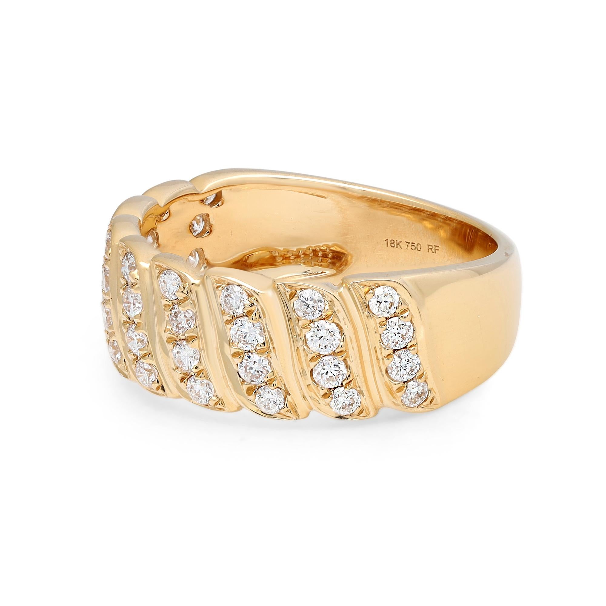 This timeless and stylish diamond band ring is crafted in 18k yellow gold and features 36 pave set dazzling round brilliant cut diamonds weighing 0.52 carat. Diamond quality: G-H and clarity VS-SI. A spectacular symbol of love, perfect for a gift or