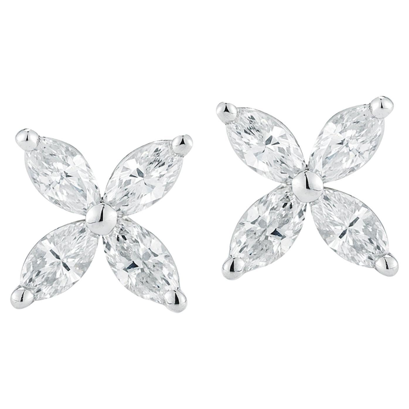 The classic arrangement of 8 stunning Marquise diamonds makes these studs an instant classic. These studs are crafted out of durable 18K white gold and set with 8 high-quality, finely cut Marquise diamonds in a floral arrangement. A simple yet