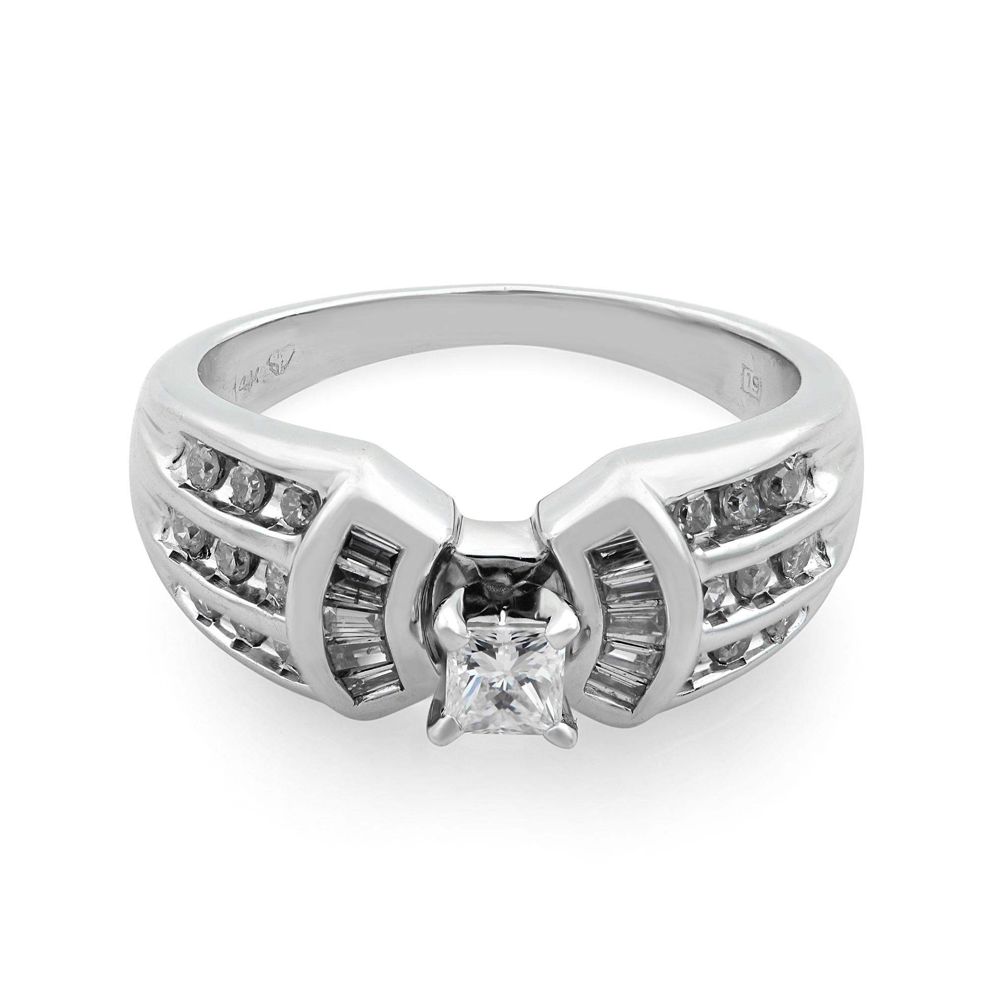 This beautiful ladies wedding ring is crafted in 14k white gold. It features a center prong set princess cut diamond with baguette and round cut diamonds on each side. Total diamond weight: 0.75 carat. Diamond quality: H color and SI2 clarity. Ring