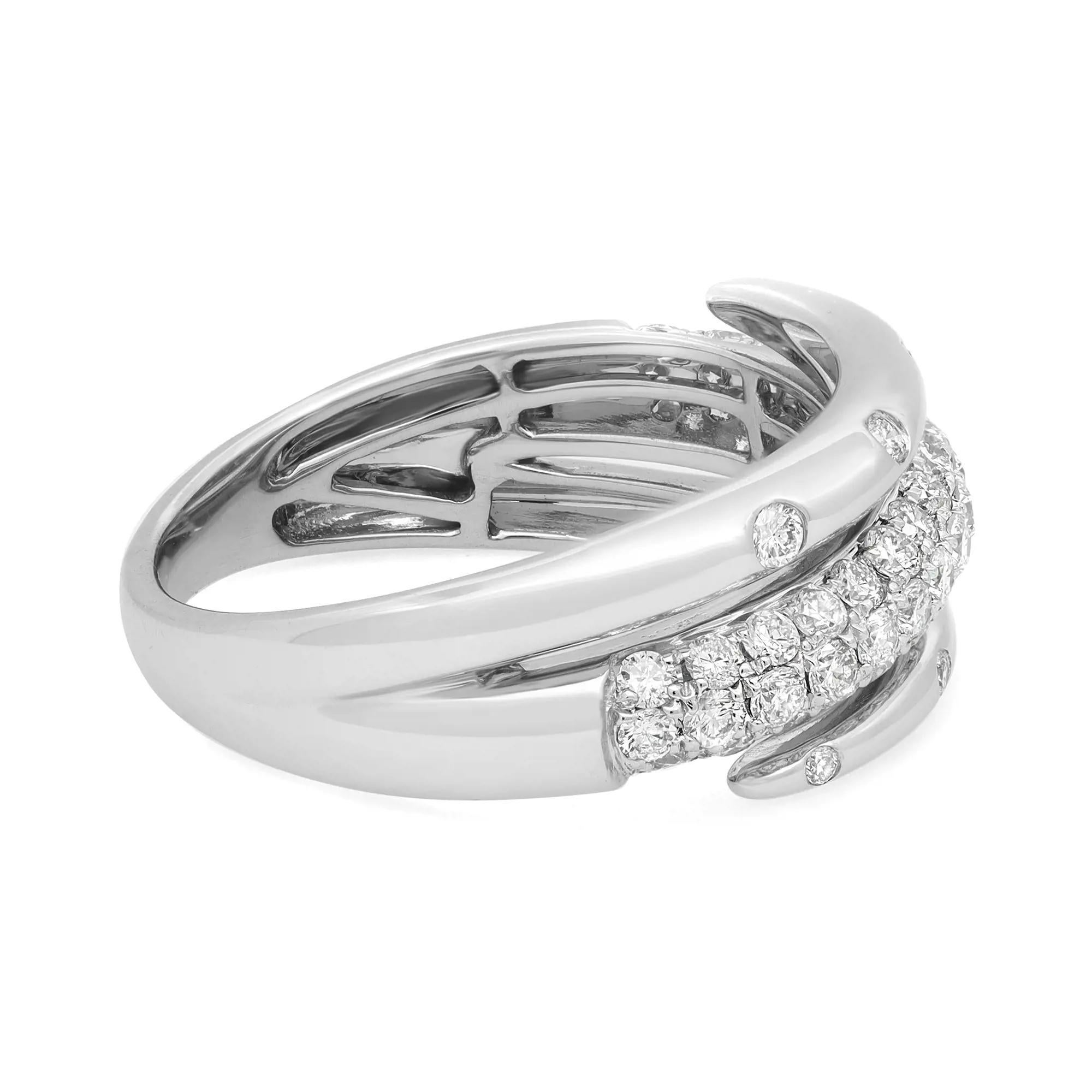 This beautiful spiral diamond ring is all about sparkle and glamour. Crafted in high polished 18k white gold. This spiral style features 57 round brilliant cut diamonds with a center row of pave set shimmering diamonds and two half rows with
