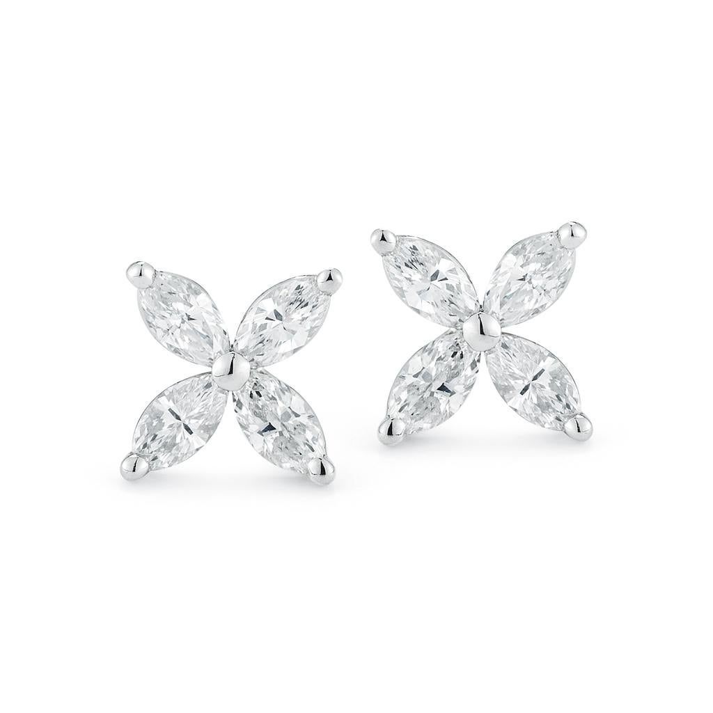 The classic arrangement of 8 stunning marquise diamonds make these studs and instant classic. These studs are crafted out of durable 18K white gold and set with 8 high-quality, finely cut marquise diamonds in a floral arrangement. A simple yet