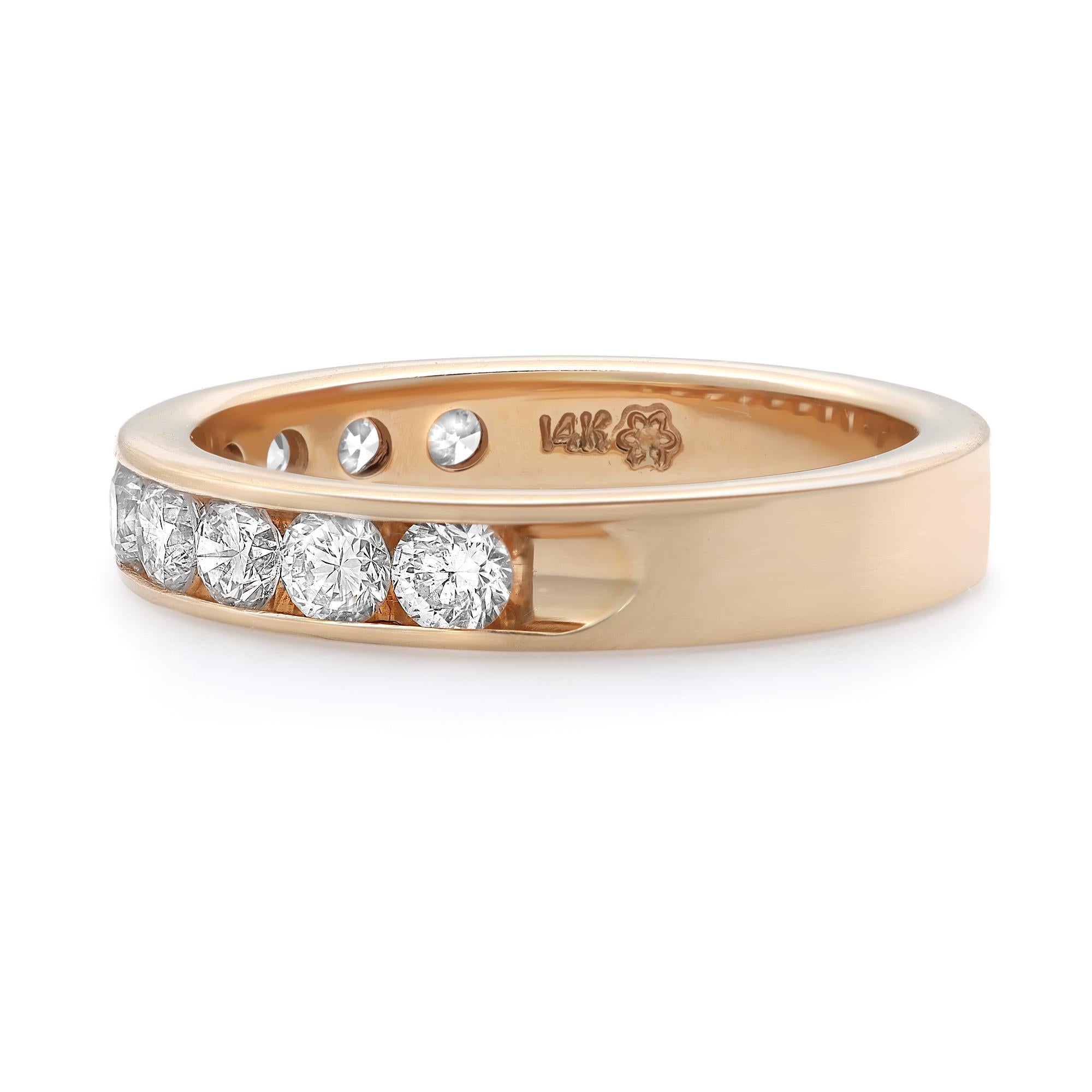 Timeless and stylish diamond wedding band ring. Crafted in fine 14k yellow gold. This ring features 10 dazzling round brilliant cut diamonds in channel setting. Perfect for a gift or as a promise ring. Total diamond weight: 1.00 carat. Diamond color