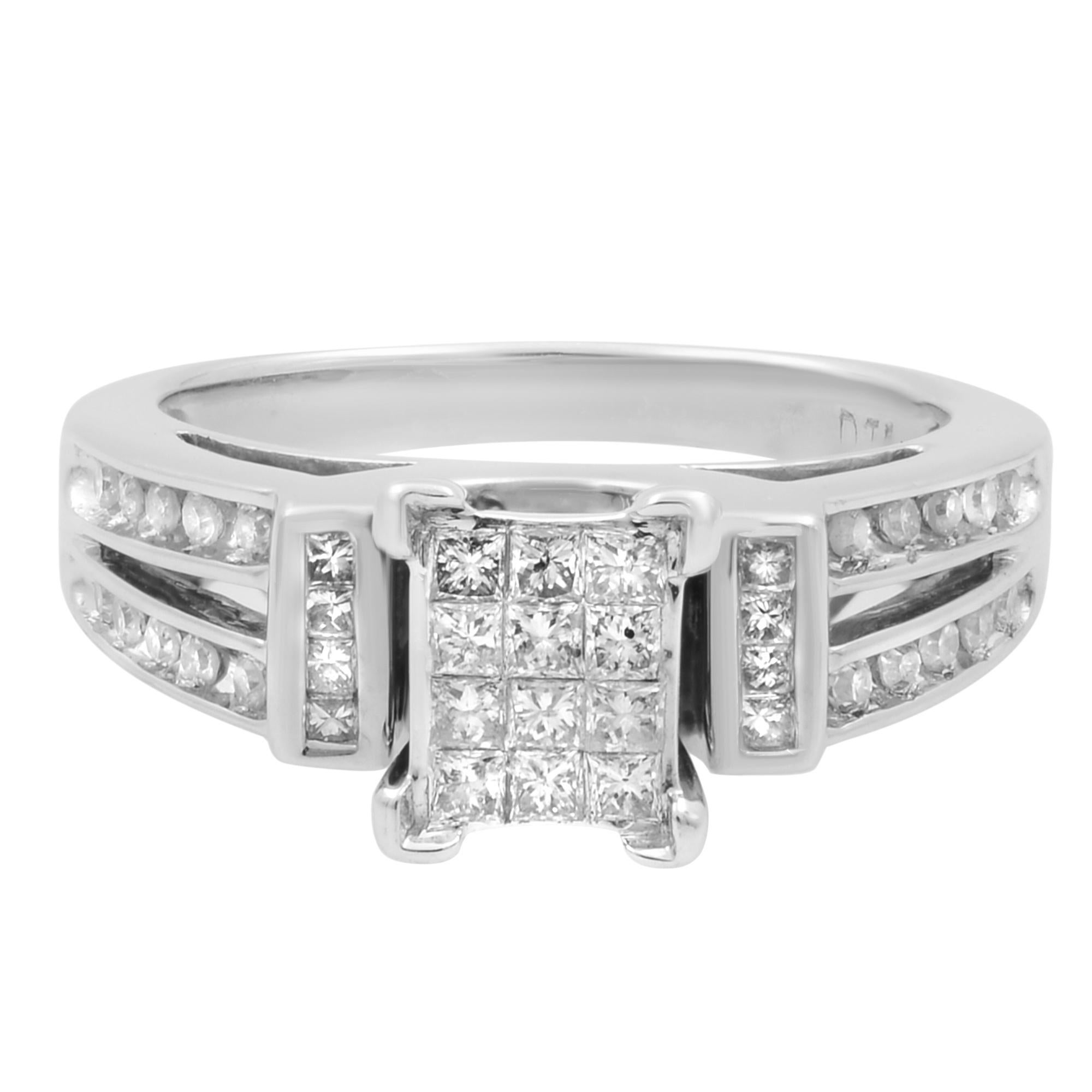 This beautiful engagement ring is crafted in 14k white gold. It features princess cut diamonds encrusted in the center rectangular shank in an invisible setting giving an illusion of a bigger size diamond with round cut diamonds on the ring