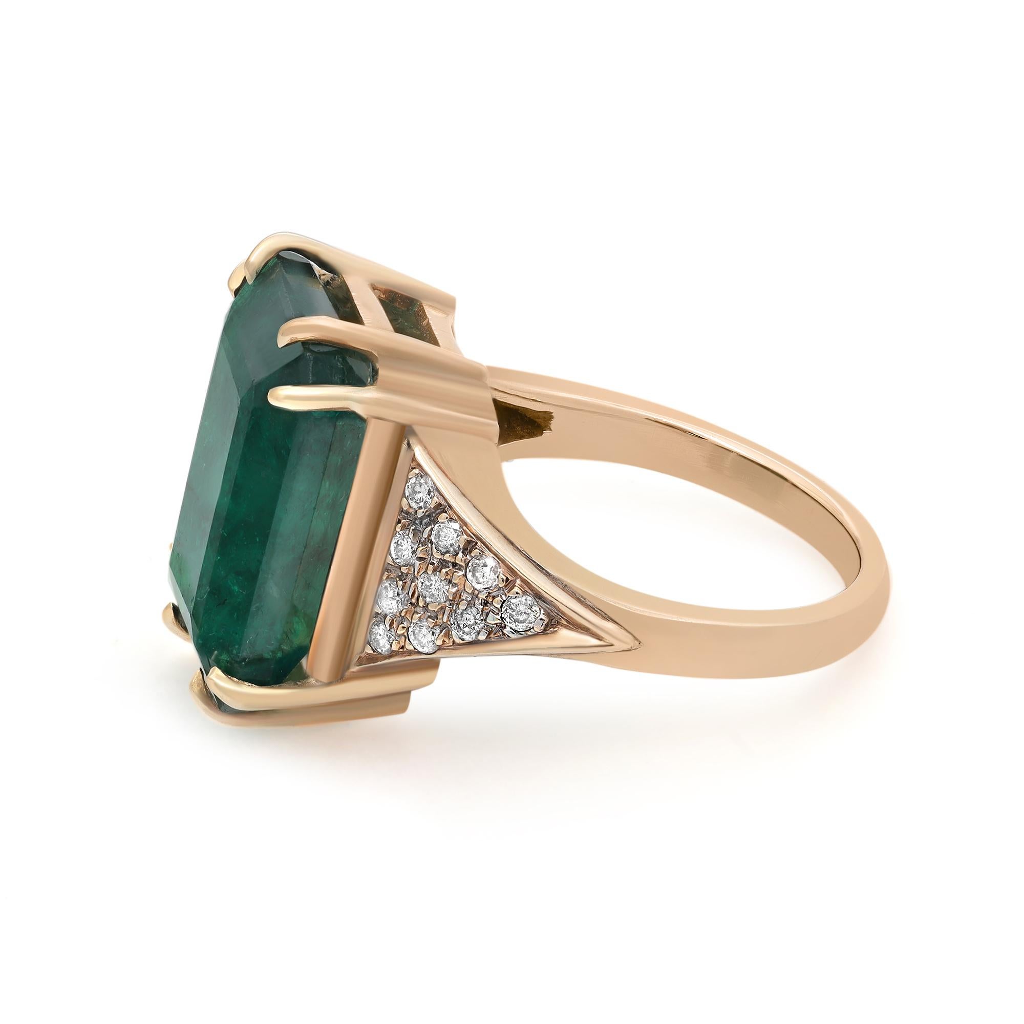 This beautiful emerald and diamond ladies ring is crafted in fine 18k yellow gold. Features an excellent prong set rectangular emerald cut emerald weighing 11.06 carats, flanked with 10 tiny round cut diamonds on each side weighing 0.20 carat.