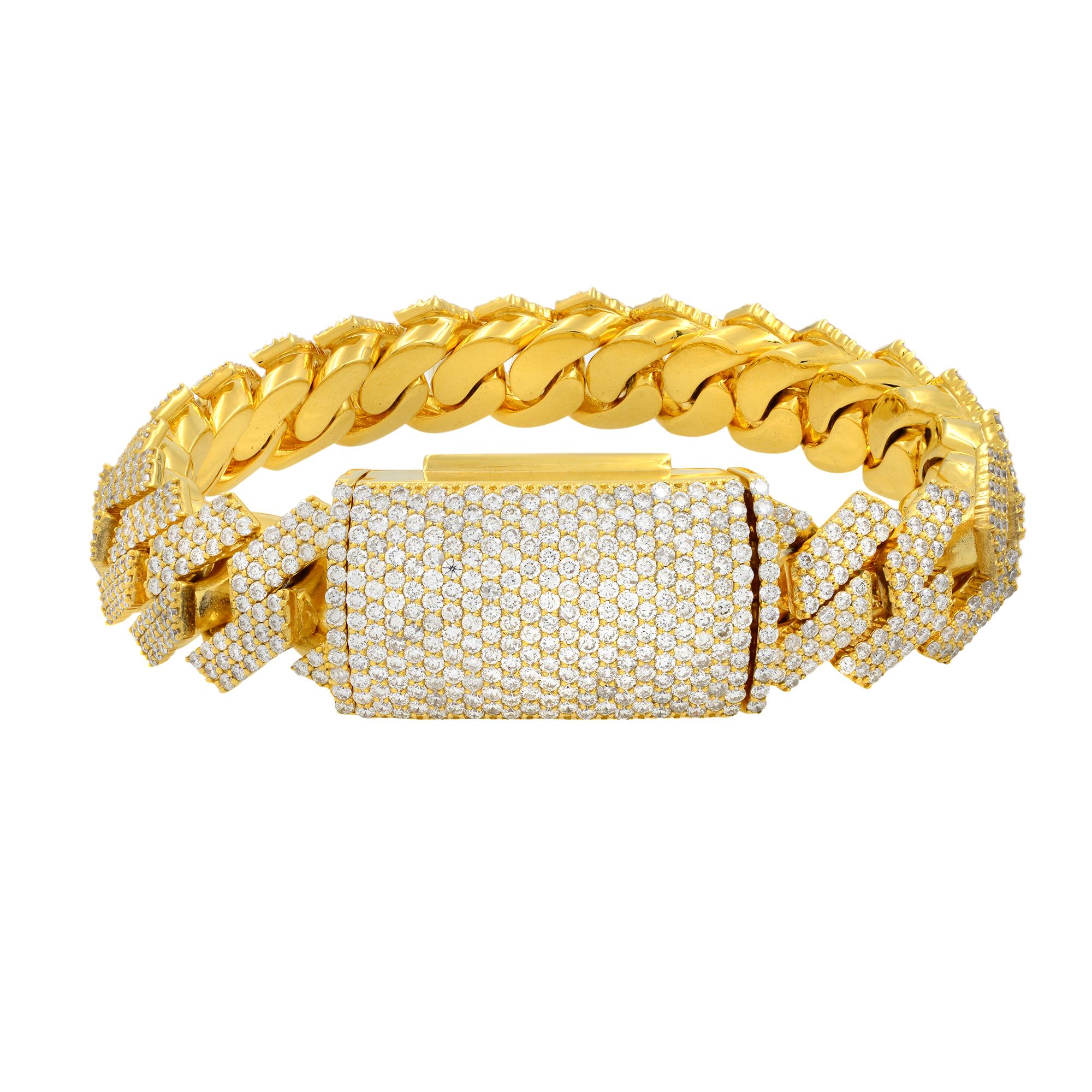This Cuban link unisex bracelet is designed in 14K Yellow Gold, carries elegant round diamonds, pave set in each of its links which brings out the diamonds more efficiently, showcasing complexity and distinction. Total carat weight, 16.50. Diamond