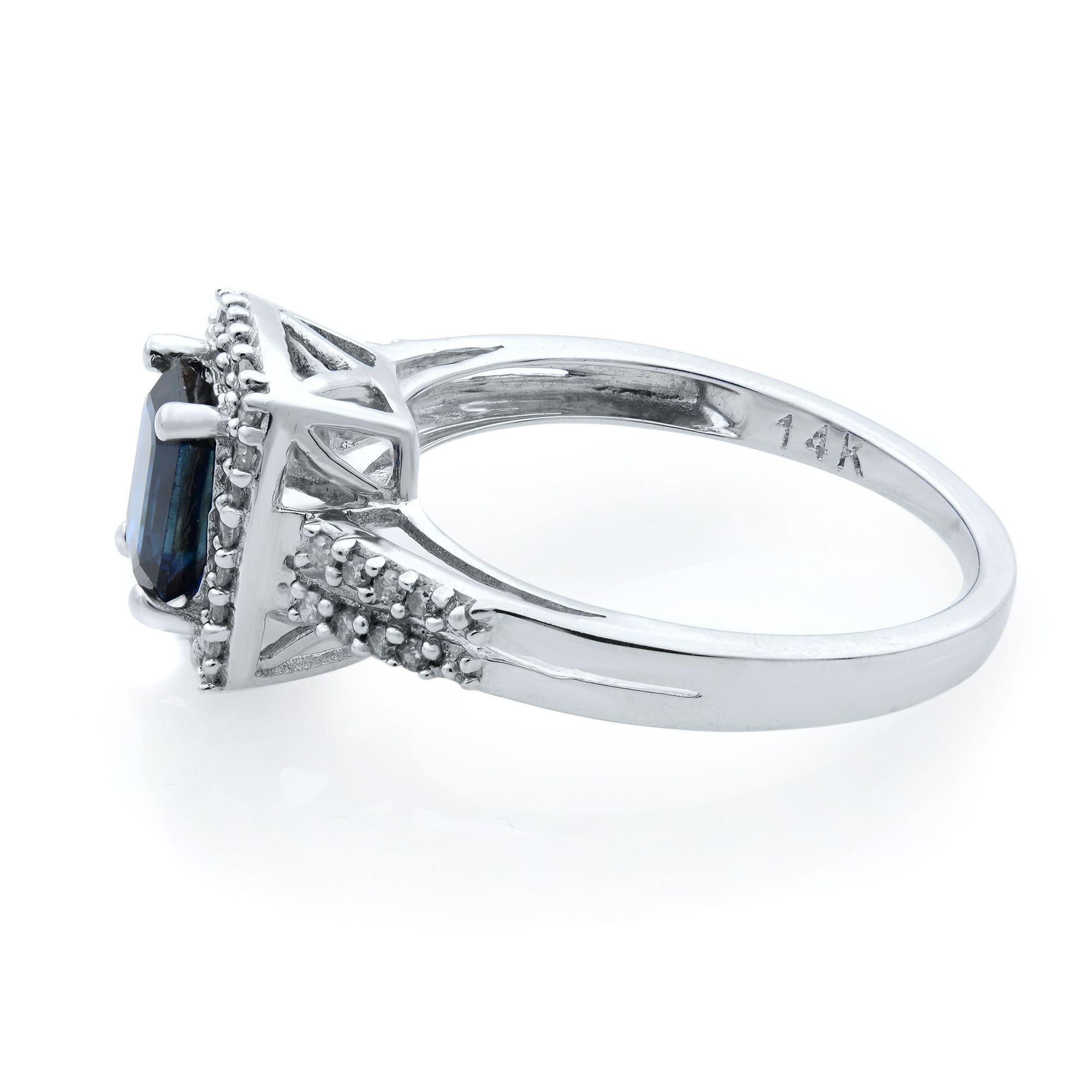 This beautiful Blue Sapphire Emerald cut engagement ring is crafted in 14k white gold. Set with 0.75cts Blue Sapphire and white round cut accent diamonds with a total of 0.25cts. Ring size 7. Comes with a presentable gift box. 