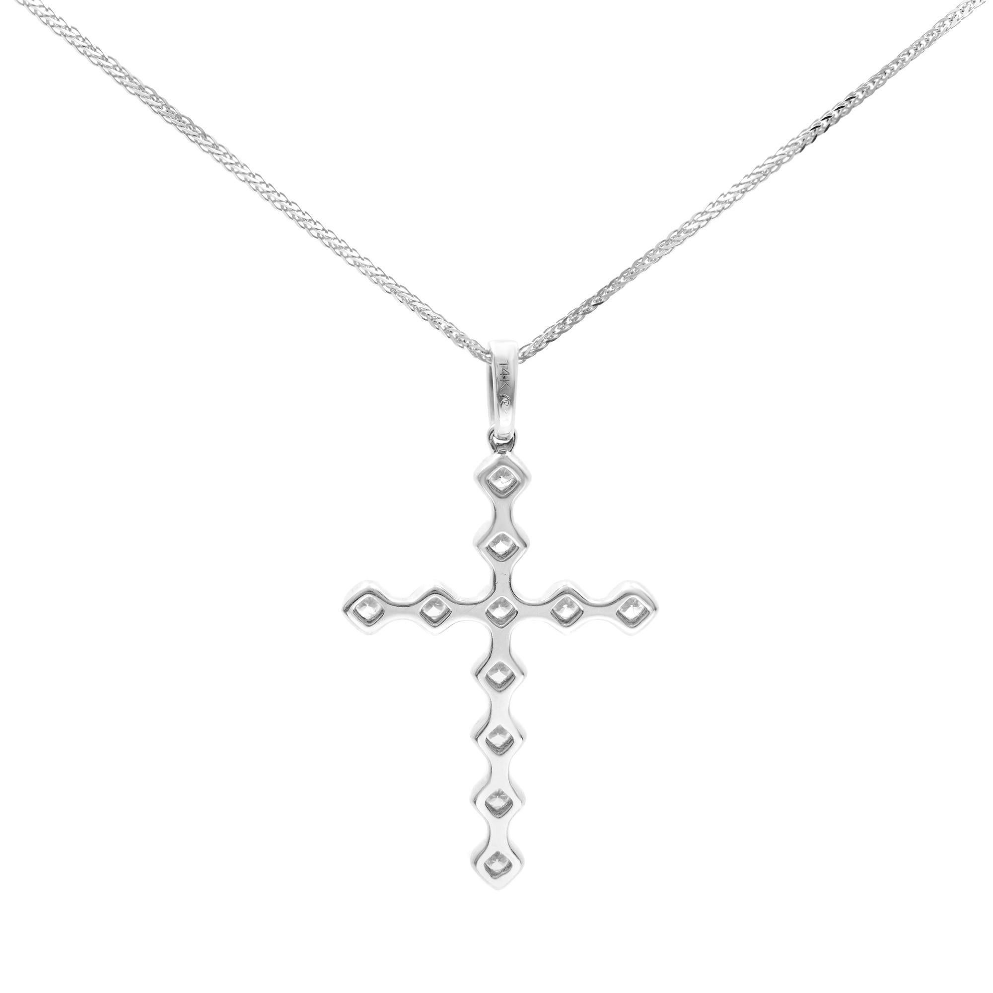 A gorgeous diamond 0.37cttw cross pendant. Includes 11 brilliant round cut diamonds. The Diamonds are very sparkly and of high quality. Diamond color I Color and SI-I Clarity. The diamonds are beautifully set in a unique bezel setting. Pendant size: