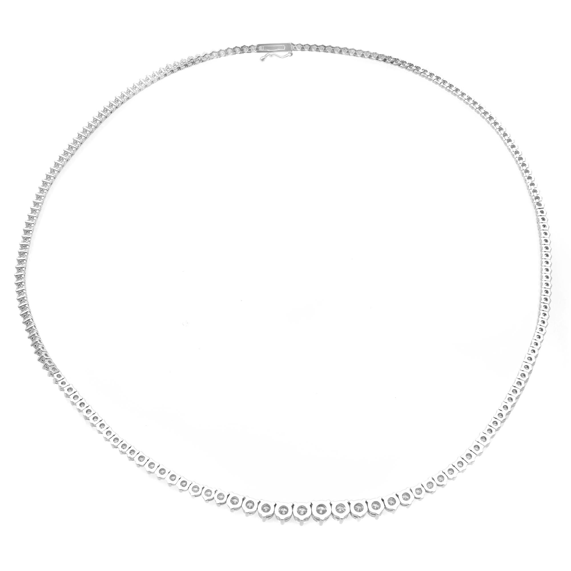 This stylish graduated necklace features glistening round diamonds that sparkle brightly for a glamorous and charming look. This piece is set with 177 round cut diamonds 10.00cttw. Diamond color F-G and VS-SI clarity. Push-button clasp. The necklace