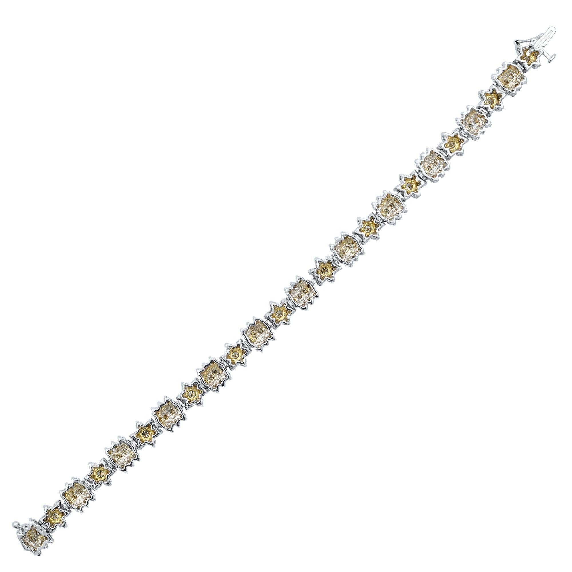 Beautiful diamond floral bracelet. crafted in 14K Yellow Gold Rhodium Plated. Features round brilliant cut diamonds weighing 6.00 carats. Comes with a presentable jewelry box.