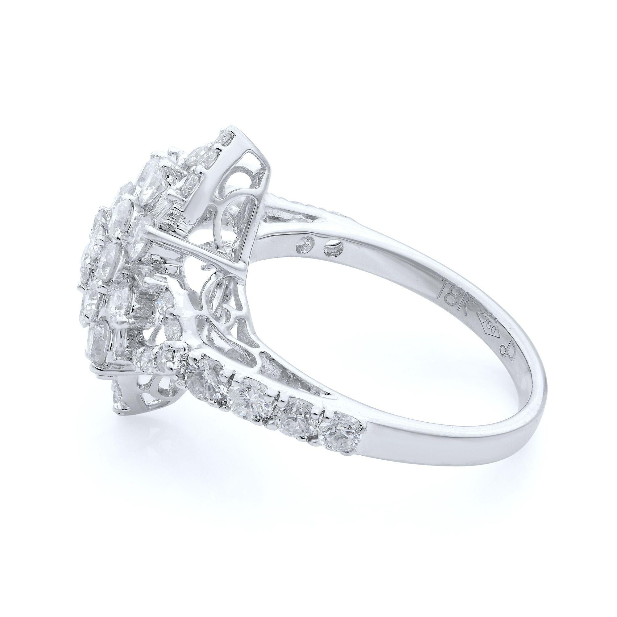 2.00 carat baguette & round cut diamonds 18k white gold flower cocktail ring. Diamonds are VVS1 clarity and color G. Ring size 7.