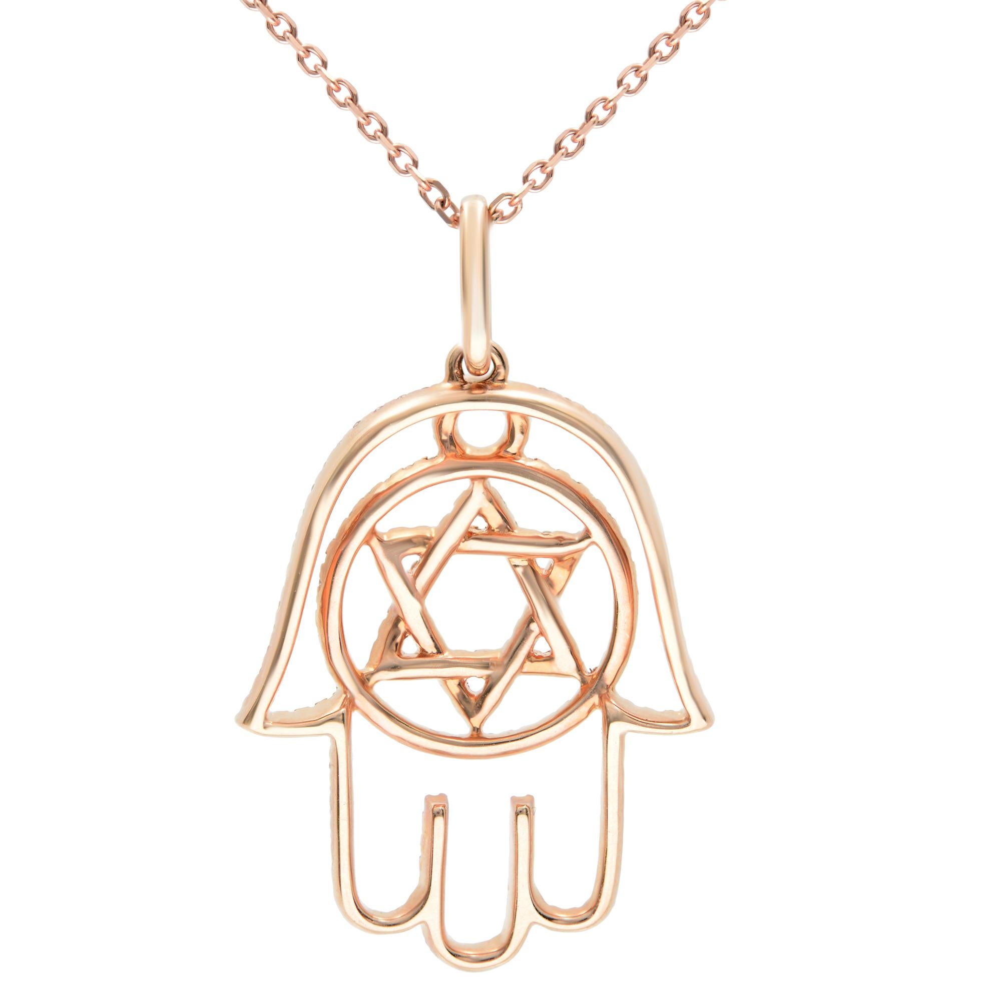 The Star of David sign and the Hamsa symbols are unified in this majestic pendant that features 0.47 brilliant round white diamonds in micro pave setting. Crafted in 14k rose gold. Diamond color G-H and VS-SI clarity. Pendant size: 25x19mm. Chain