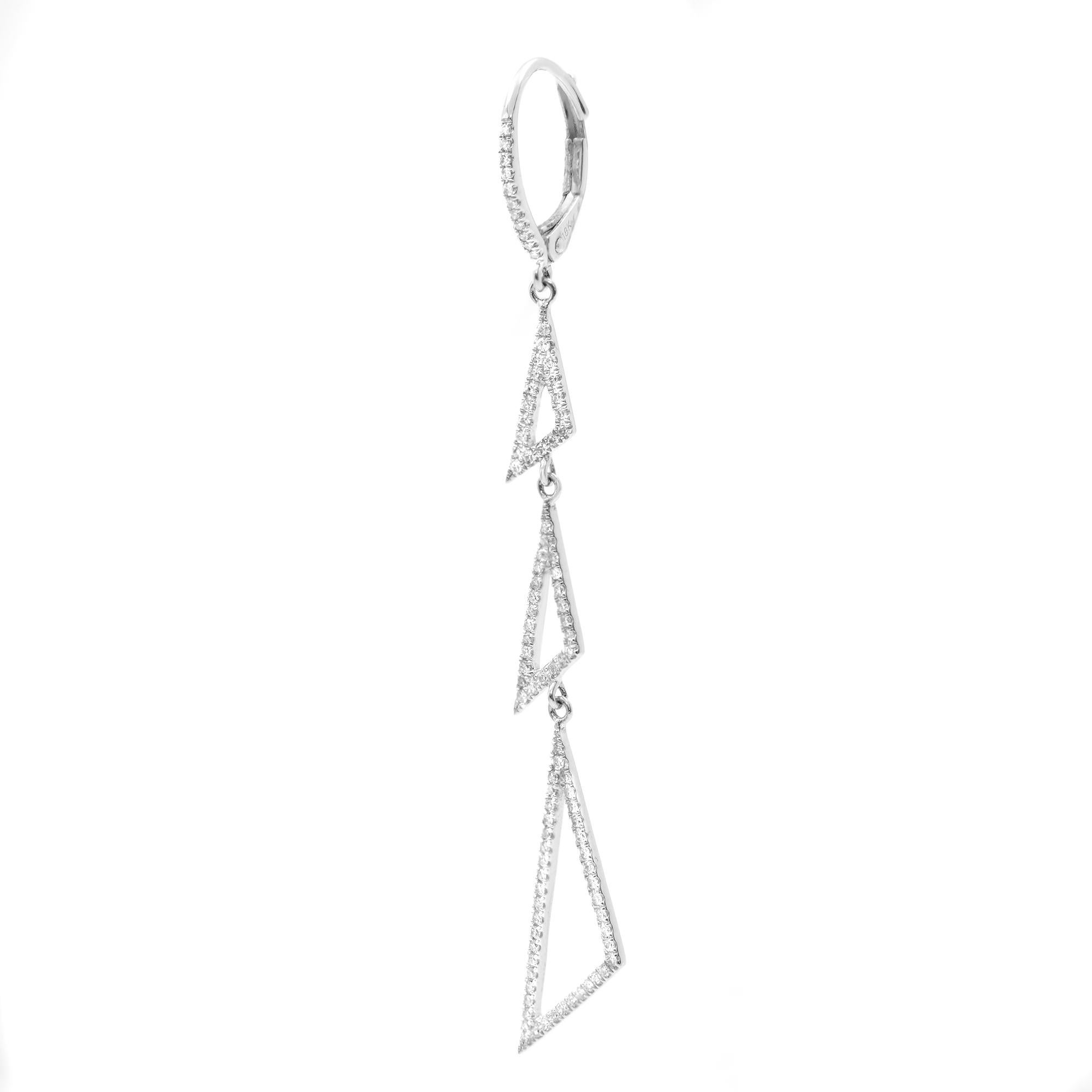 Shimmering round diamonds sway along 18K white gold chains in these stunning women's drop earrings. Secured with lever backs. The earrings have a total diamond weight of 0.45cttw. Diamond color I and clarity SI-I. Earring length: 2.50 inches. These