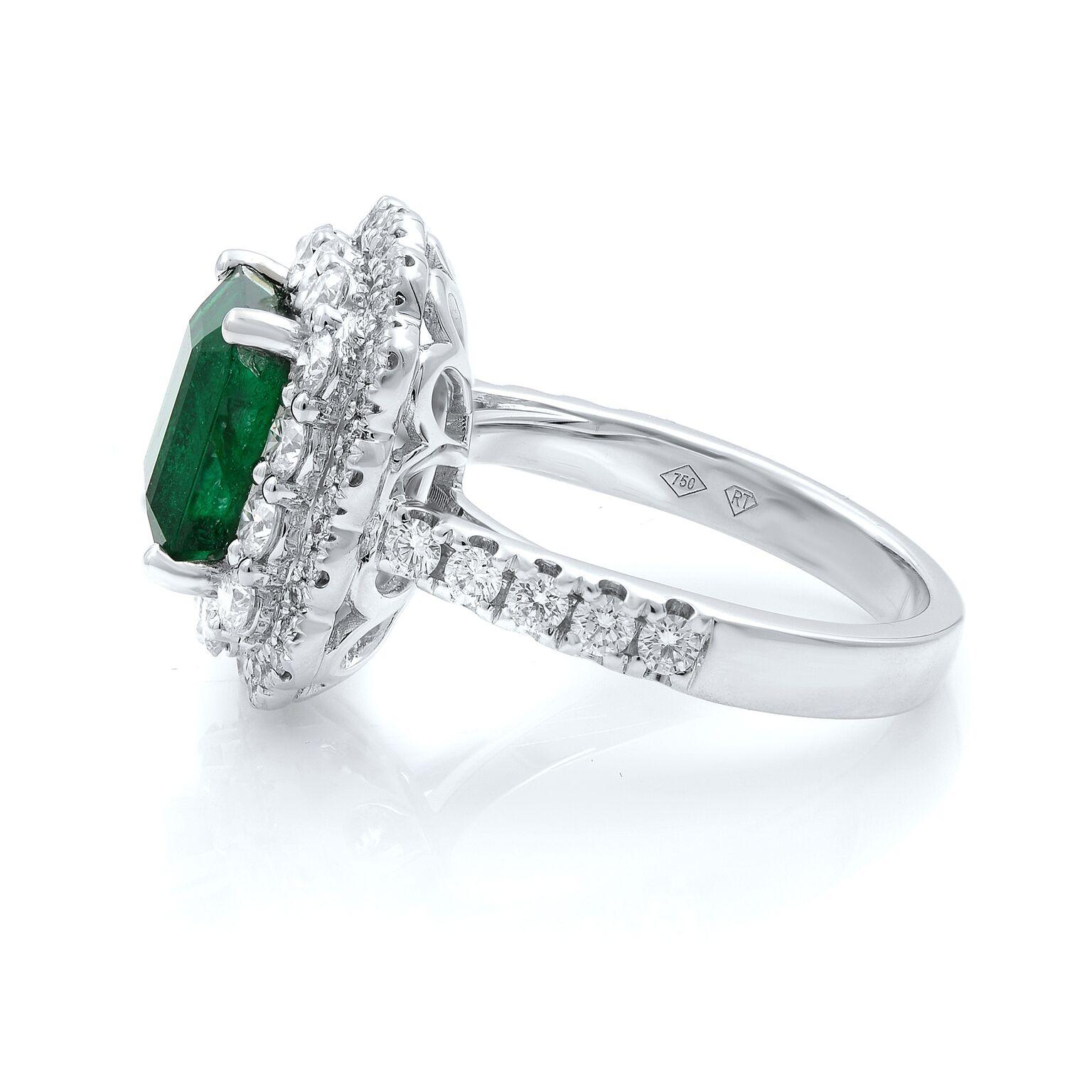 Our beautiful green emerald and diamonds engagement ring. 18k white gold. Emerald cut is totaling in 2.95cts and diamonds are 1.26cts. GIA certificate included. Size: 6.75. 