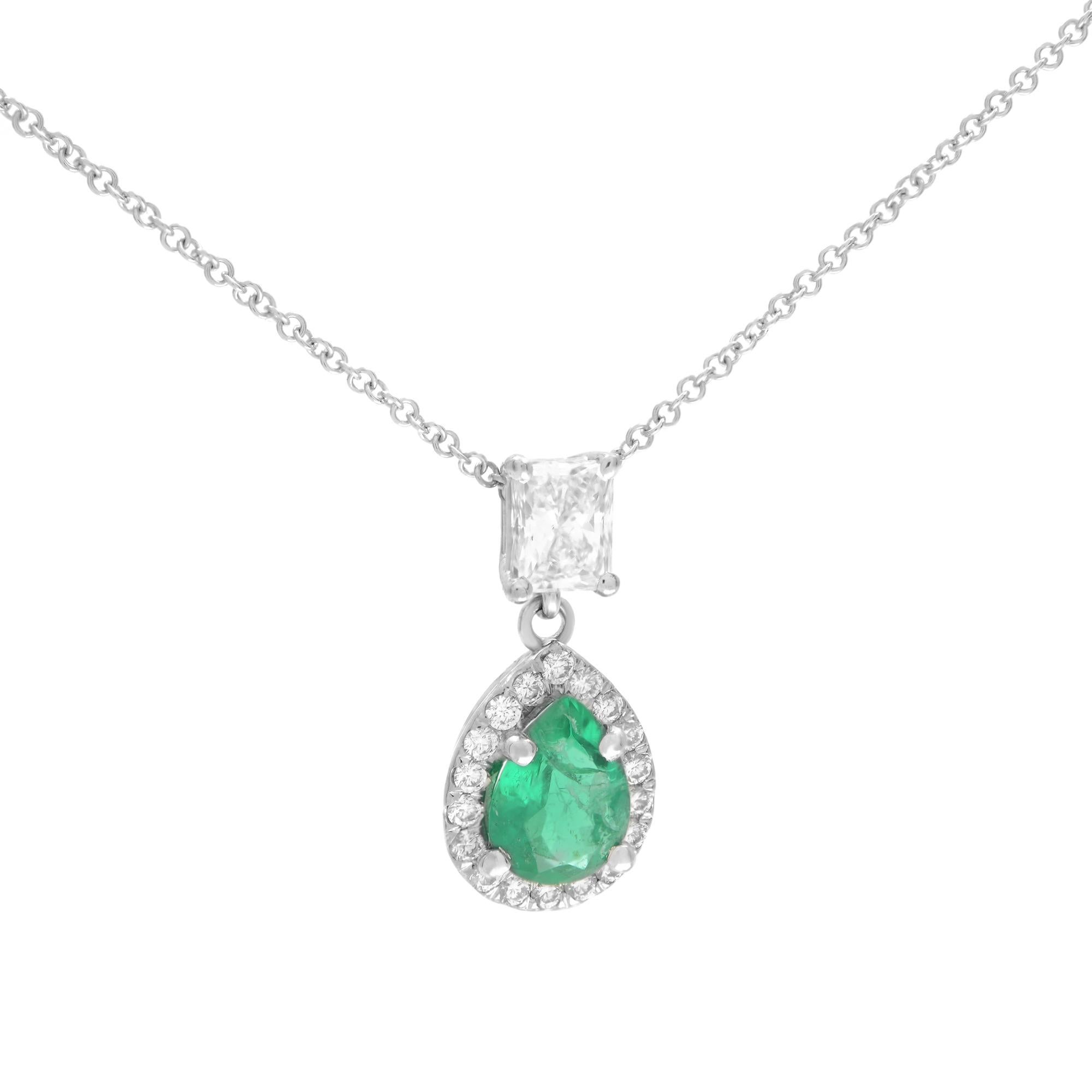 This classic pendant features a 0.83 carat pear-shaped green emerald with a diamond halo secured in a prong setting. A brilliant 0.53 carat radiant diamond sits atop the lush green gemstone adding to the design's beauty. Simple yet alluring, this