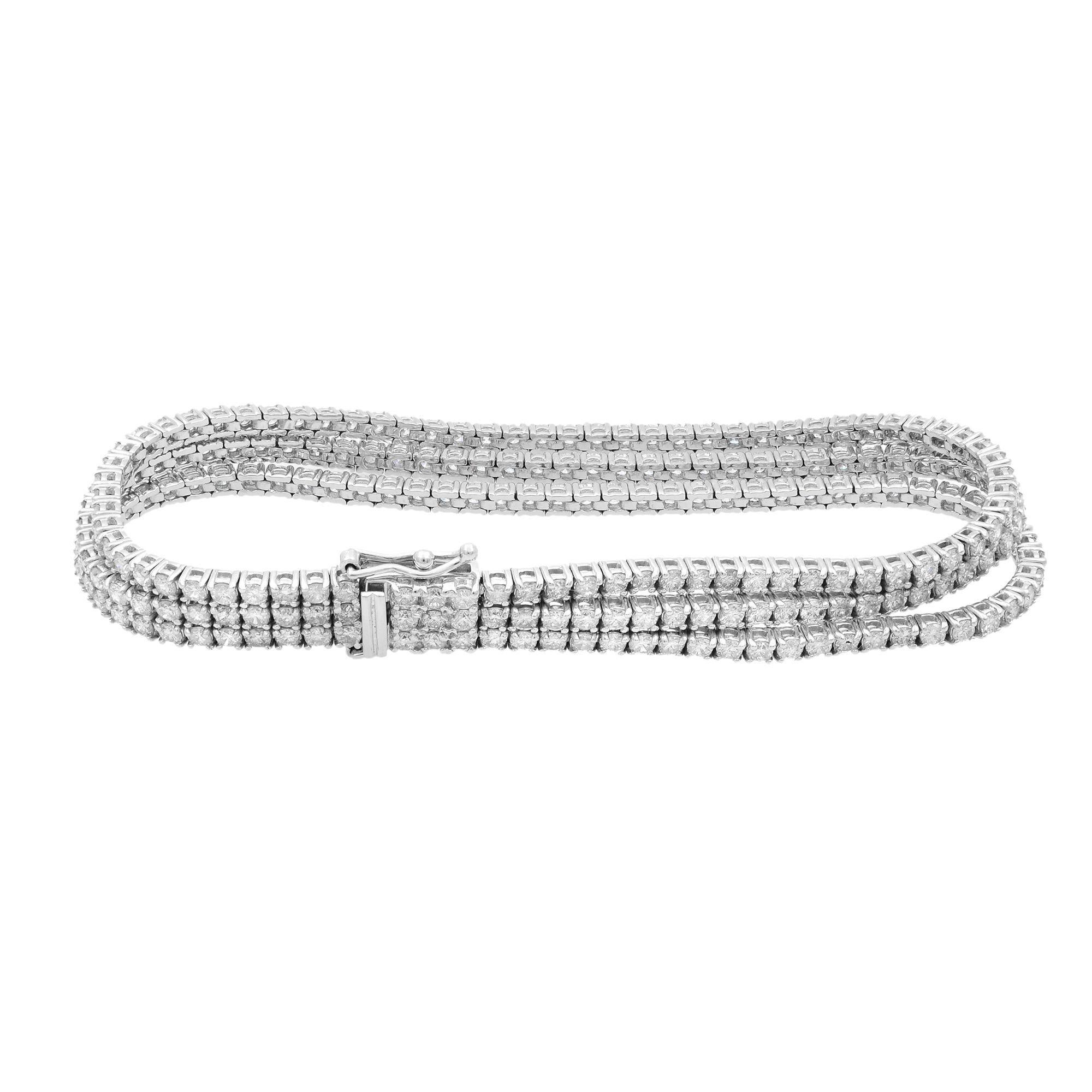 This gorgeous 3-row diamond tennis bracelet showcases 14.20 carats of sparkling prong set round cut diamonds. Each stone expertly set in a lustrous 14K white gold frame. Featuring a trendy 3-row, prong-set design and a flexible fit. Diamonds are G