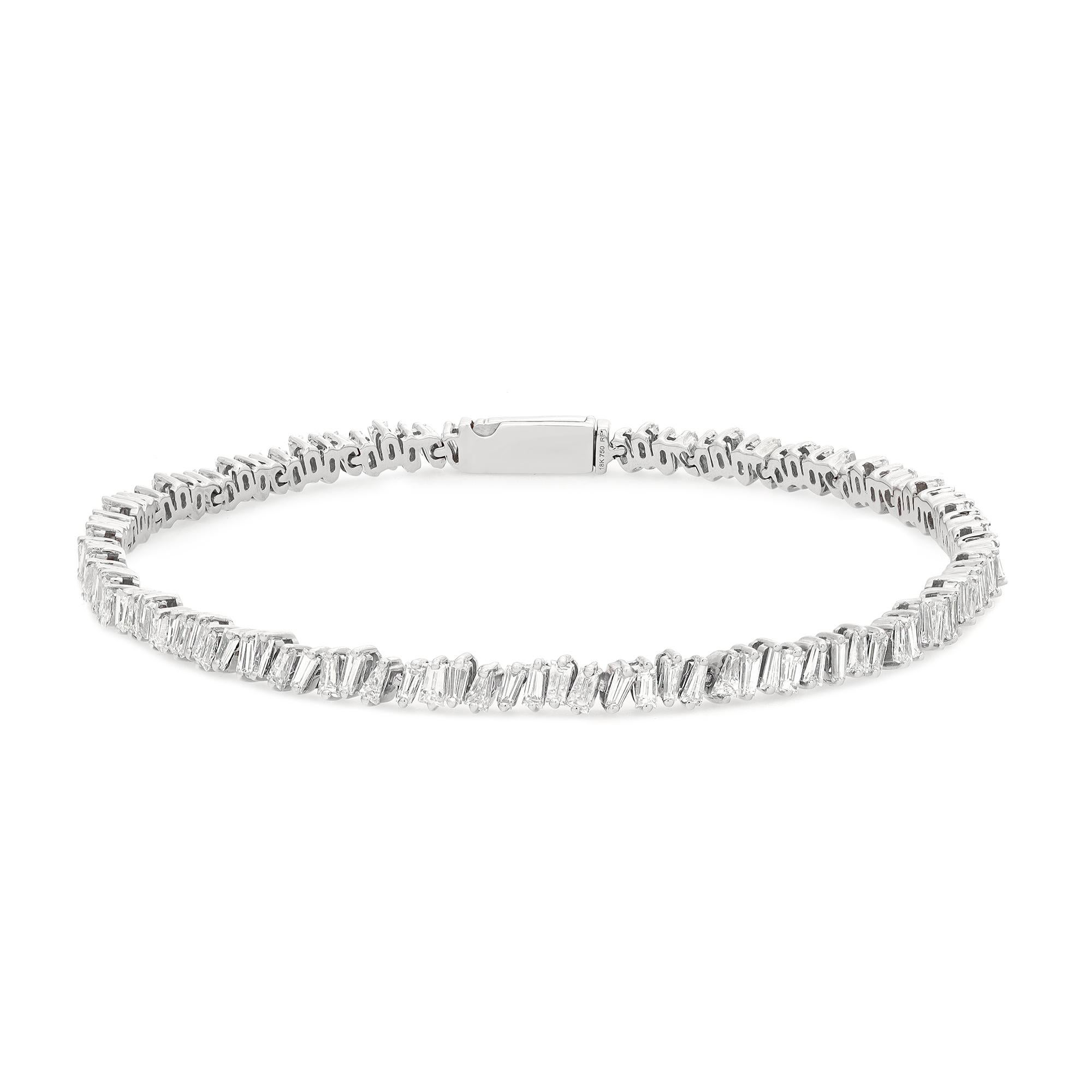 This beautifully crafted Rachael Koen timeless beauty tennis bracelet features baguettes cut natural diamonds set in prong setting. Crafted in 18k White Gold. This truly gorgeous handmade modern creation is a great addition to your jewelry