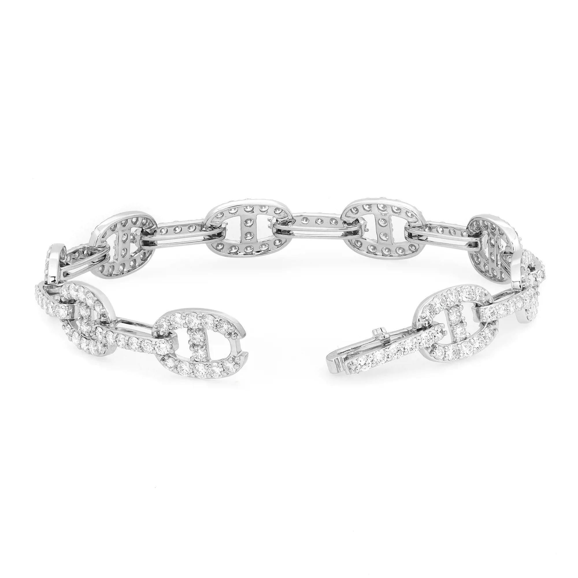 This trendy and chic bracelet features diamond studded links crafted in 18K white gold. Total diamond weight: 5.00 carats. Diamond quality: color G-H and clarity VS-SI. Bracelet length: 7 inches. Link size: 12mm x 9mm. Total weight: 13.78 grams.
