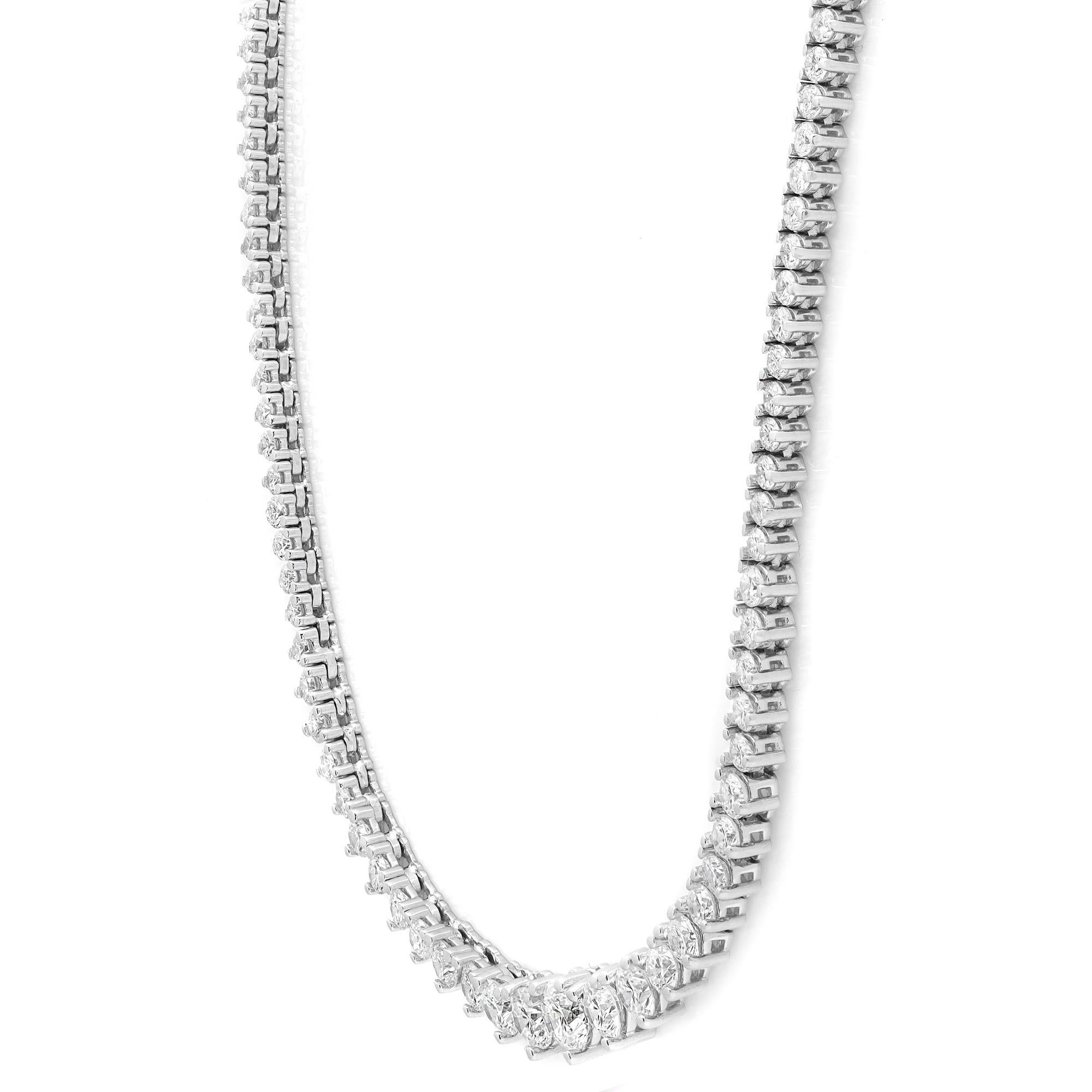 This stylish tennis necklace features glistening graduating round cut diamonds that sparkle brightly for a glamorous and charming look. This piece is set with round cut diamonds weighing 6.00 carats. Diamond quality: G-H color and VS-SI clarity.