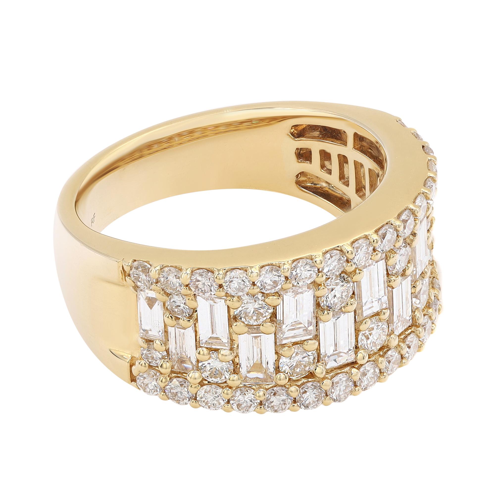Modern ladies thick band ring crafted in 18k yellow gold. This ring features baguette cut and round cut sparkling diamonds encrusted in prong setting. Total diamond weight: 2.11 carats. Diamond quality: color G-H and clarity VS-SI. Ring size: 6.75.