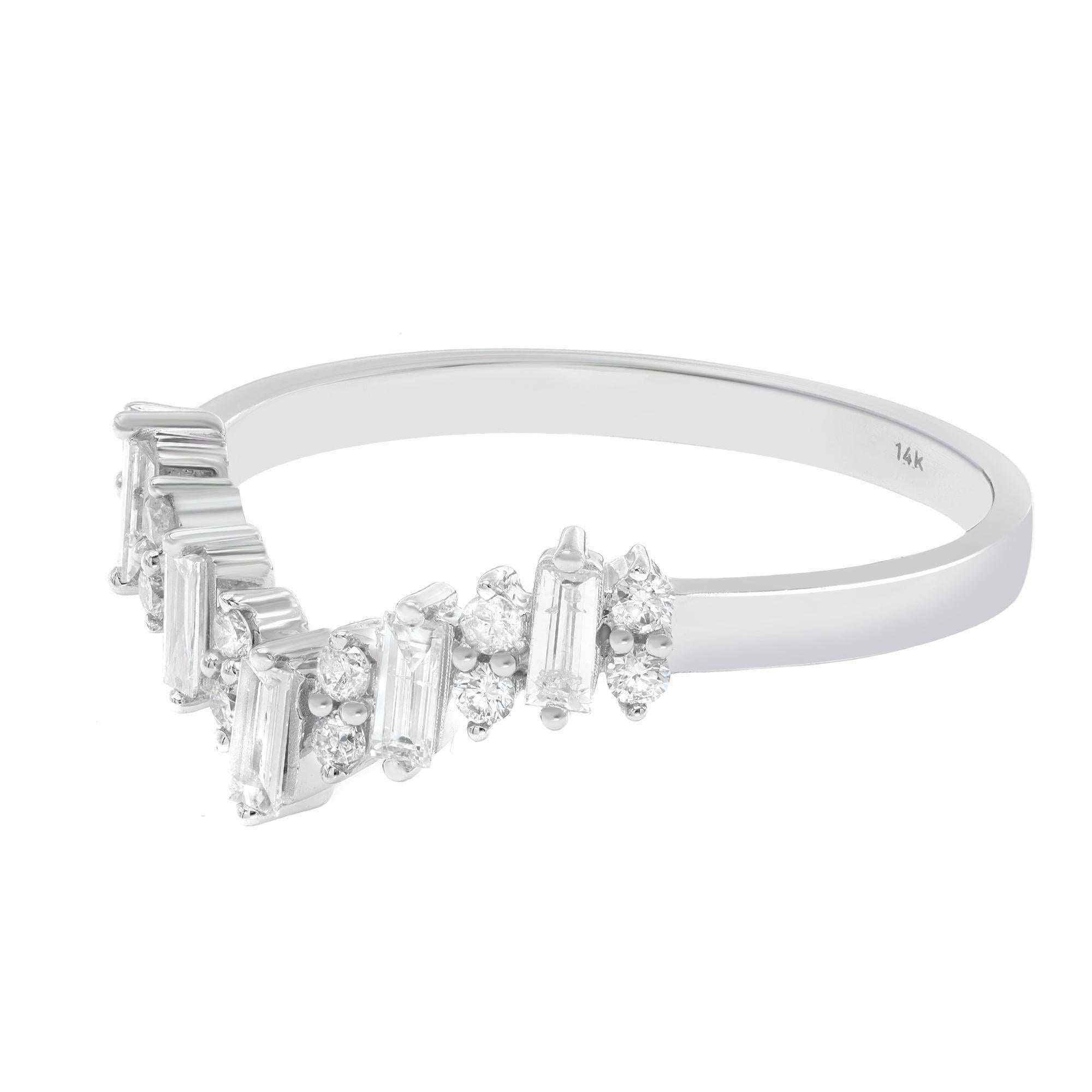 This beautiful and delicate diamond ring is a perfect fit for any occasion. Crafted in 14K white gold. Features 5 Baguette cut and 12 round cut diamonds in prong setting. Diamond color G-H and clarity VS-SI. It's stackable and easy to mix and match.