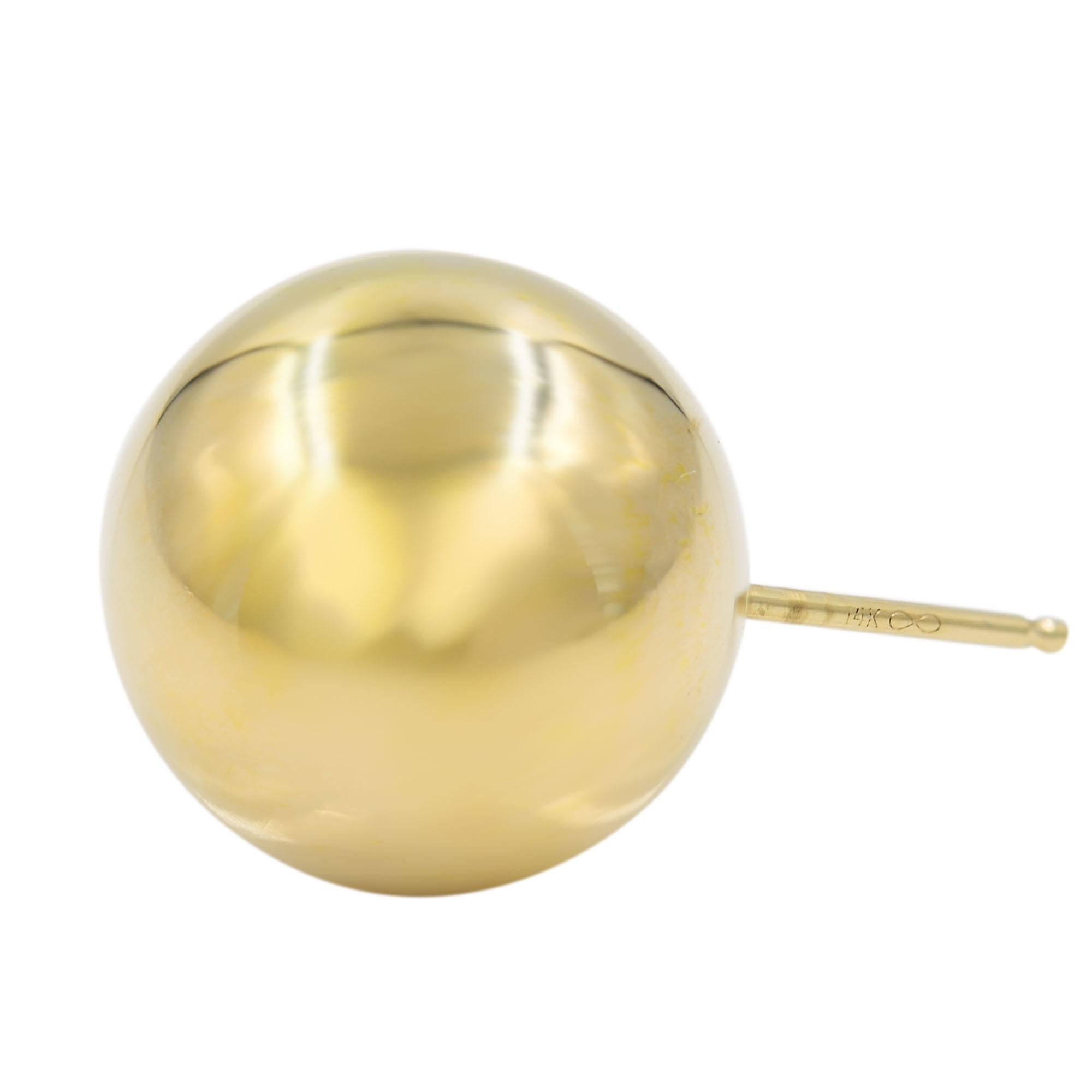 Ball stud earrings crafted in 14k yellow gold are perfect for everyday wear. Actual gold, lightweight and festive. Size: 6mm. Closure: push backings. Comes with a presentable gift box.