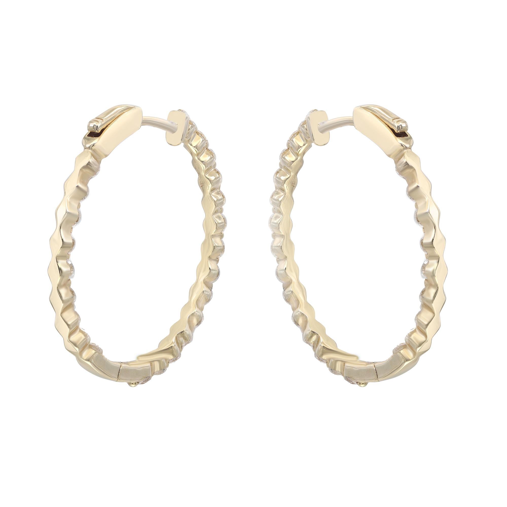 Sparkle all way with these beautiful diamond hoop earrings. Crafted in 14K yellow gold. These hoop earrings are lined with single shared prong set round brilliant cut diamonds weighing 1.43Cttw. The stones line only half of the outer hoop and half