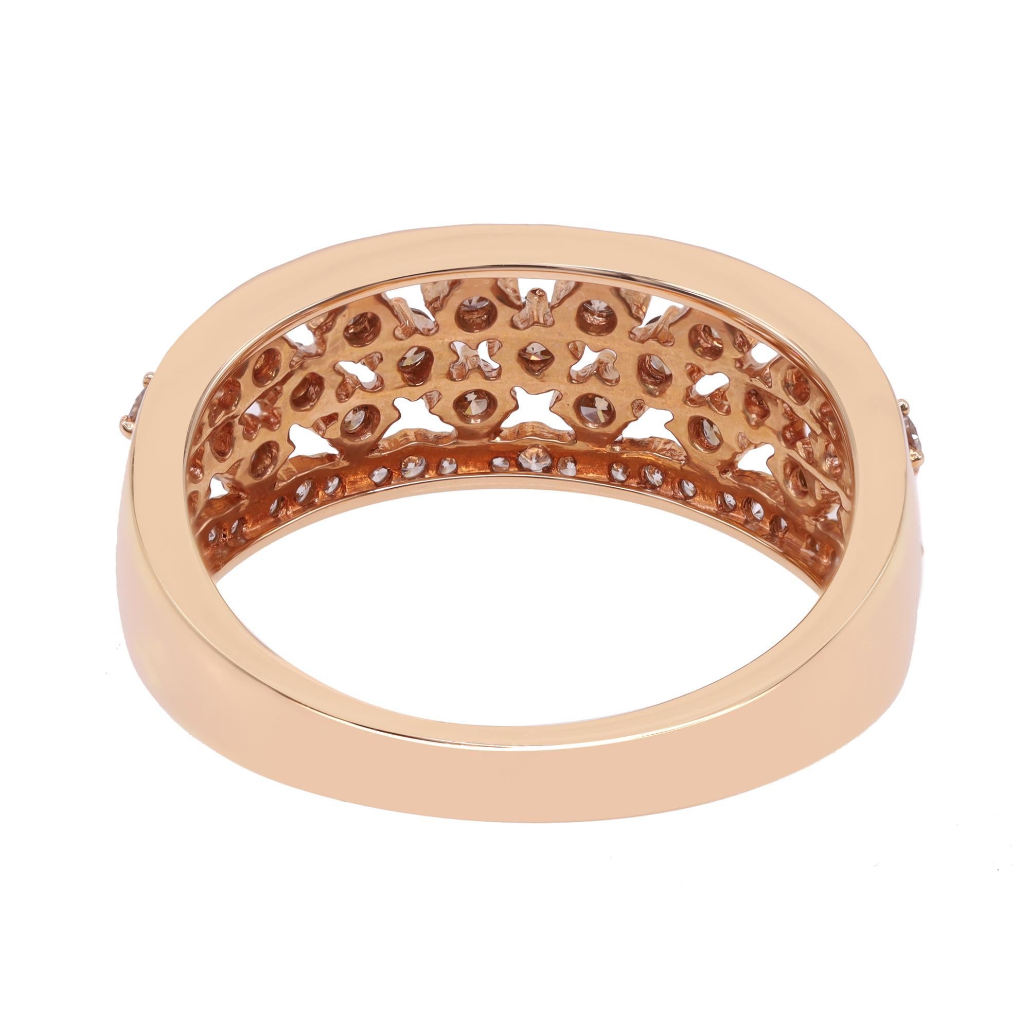 This classic diamond band ring crafted in 18k rose gold is set with round cut brown and white diamonds in half circle around the finger. The total diamond carat weight is 0.89cts. The white diamonds are in color G-H and clarity SI1-SI2. This band