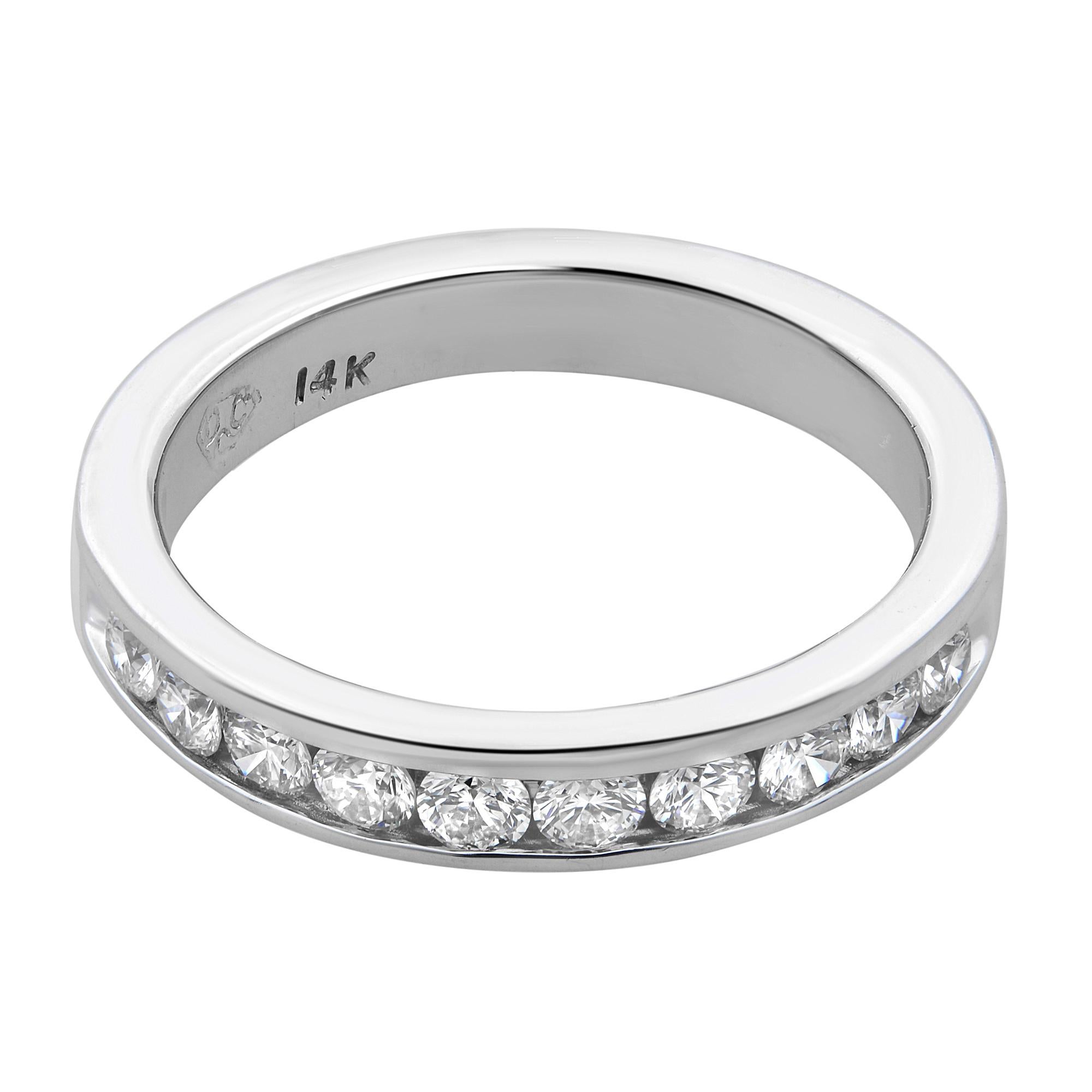 A classic channel set wedding band. Crafted in 14k white gold and set with 10 brilliant cut round diamonds. This band is perfect with any engagement ring. Pair it with other diamond bands for a stackable look or wear it alone as an anniversary band.