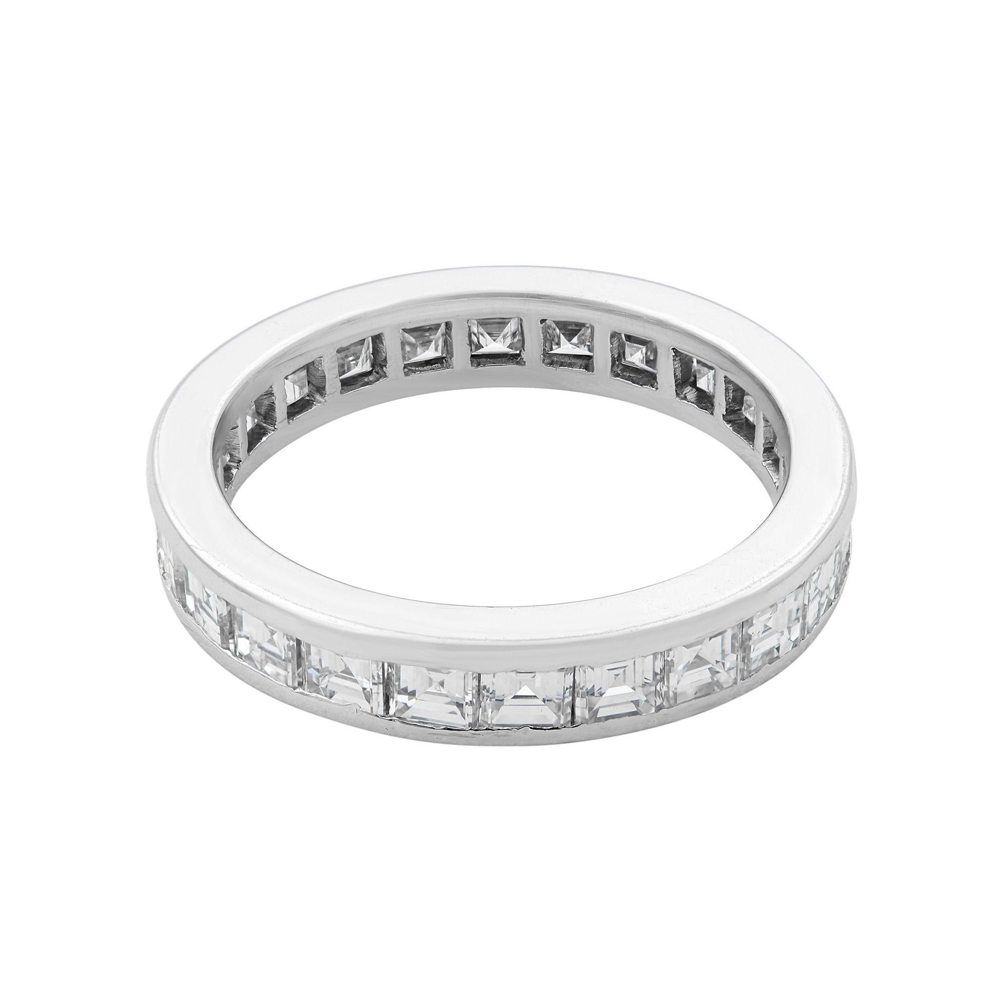 Square cut channel set diamond eternity wedding band crafted in 14K white gold. Ring size 6. Width of the ring is 3.60mm. Total diamonds 24 with carat weight is 1.25 cttw. Diamond color G and clarity VS2. Comes in a presentable gift box.