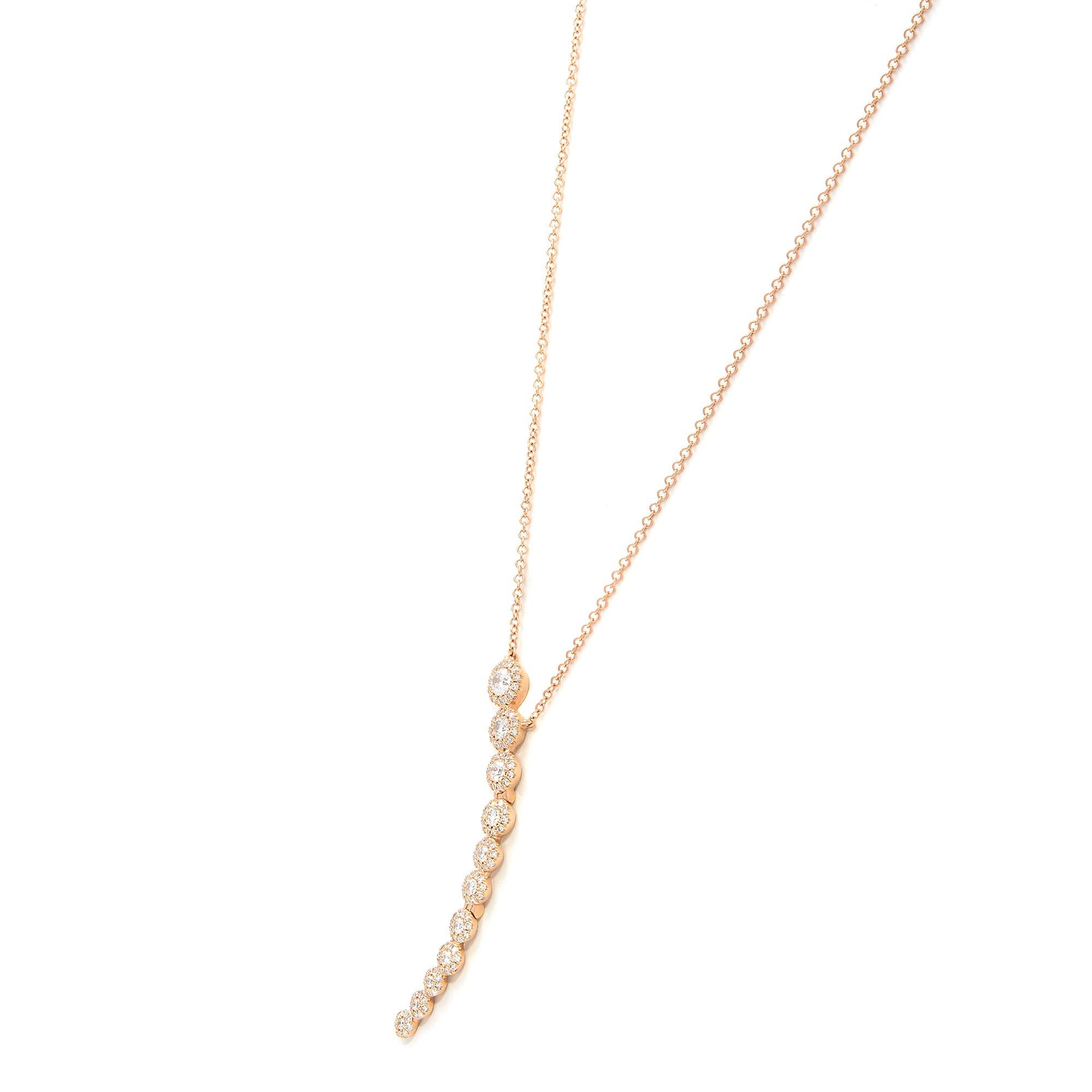 This beautiful and delicate diamond pendant will leave everyone speechless the moment they see it. Crafted in high polished solid 14k rose gold this necklace is set with brilliant round cut diamonds of G-H color and clean VS clarity. Total Carat