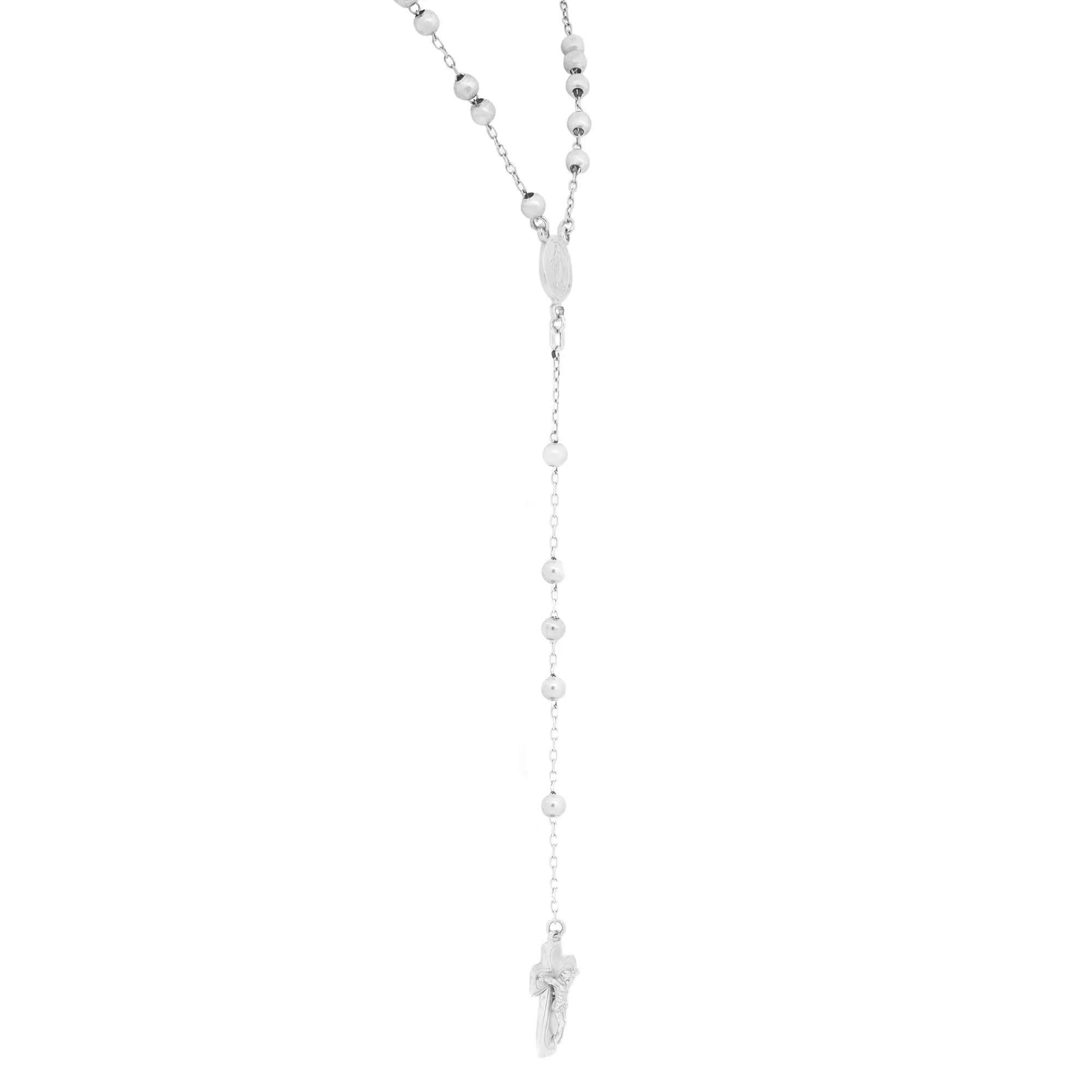 A statement of faith, this rosary inspired beaded necklace features a medallion of the blessed virgin and a powerful cross. Crafted in lustrous 14K white gold. Chain length: 24 inches. Cross size: 21.4mm x 12.1mm. Total weight: 14.00 grams. Comes