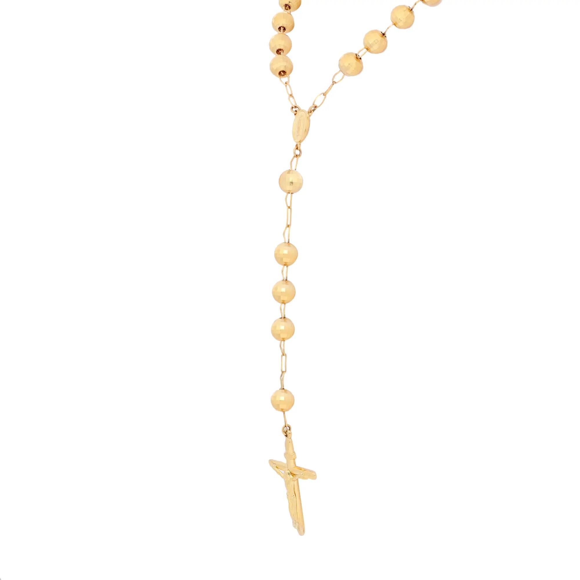 Diese vom Rosenkranz inspirierte Perlenkette mit einem Medaillon der Heiligen Jungfrau und einem mächtigen Kreuz ist ein mutiges Glaubensbekenntnis. Gefertigt aus glänzendem 14-karätigem Gelbgold. Kettenlänge: 30 Zoll. Kreuzgröße: 1,5 Zoll x 1 Zoll.
